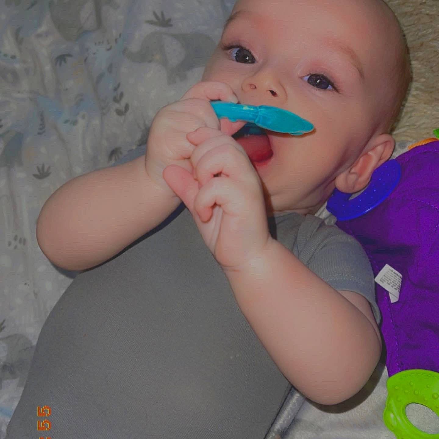 Granger is registered to the contest to win money with this photo: arm, baby, baby_toddler_clothing, cheek, ear, eyebrow, eyelash, finger, gesture, happy, iris, lip, mouth, neck, nose, person, skin, sleeve, thumb, toddler