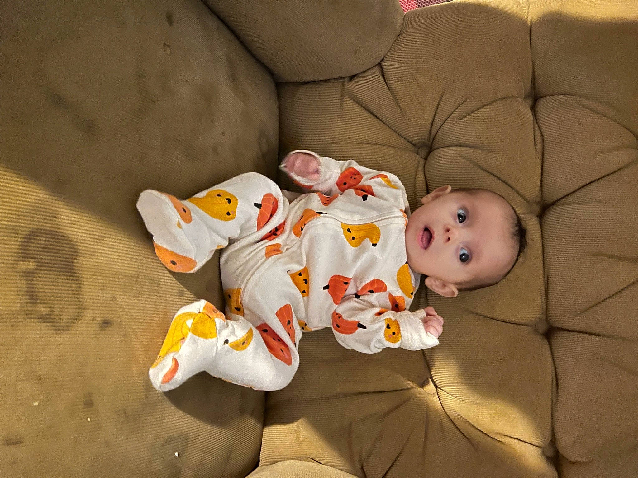 Ravyn joined the competition — help win amazing prizes! baby, baby_toddler_clothing, carmine, cheek, child, comfort, eye, face, flooring, foot, head, human_body, leg, linens, person, sitting, sleeve, surprise, textile, toddler