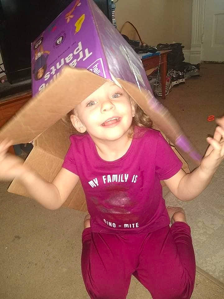 Aelianna Raelyn joined the competition — help win amazing prizes! baby_toddler_clothing, child, cool, event, fashion_accessory, fun, gesture, hairstyle, happy, headgear, headwear, joy, magenta, party_supply, person, pink, purple, sleeve, smile, t_shirt