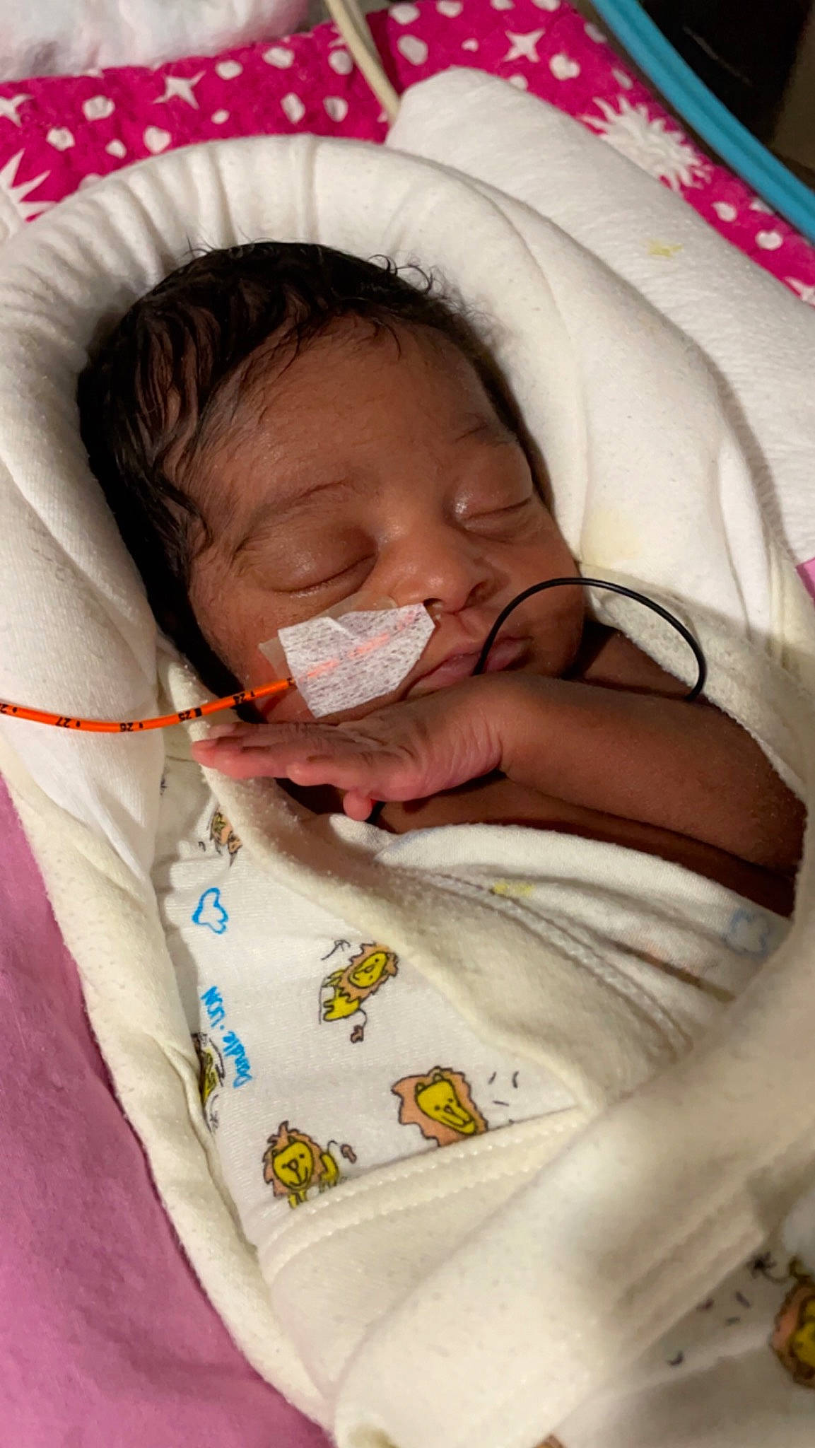 Honesty is registered to the contest to win money with this photo: baby, baby_toddler_clothing, cheek, chin, comfort, eye, eyebrow, eyelash, finger, happy, human_body, iris, lip, mouth, neck, nose, person, product, skin, smile