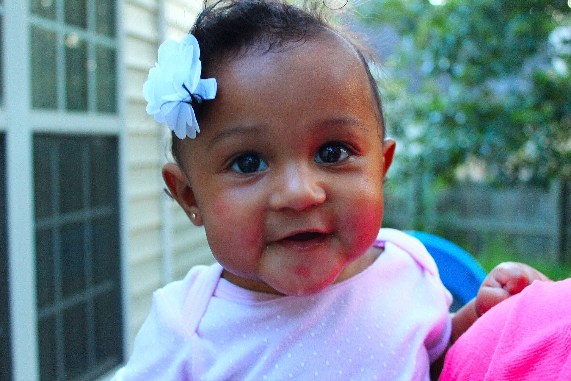 Saige is registered to the contest to win money with this photo: boy, cheek, child, day, ear, eye, fun, girl, happiness, head, human, infant, laughter, person, pink, skin, smile, toddler