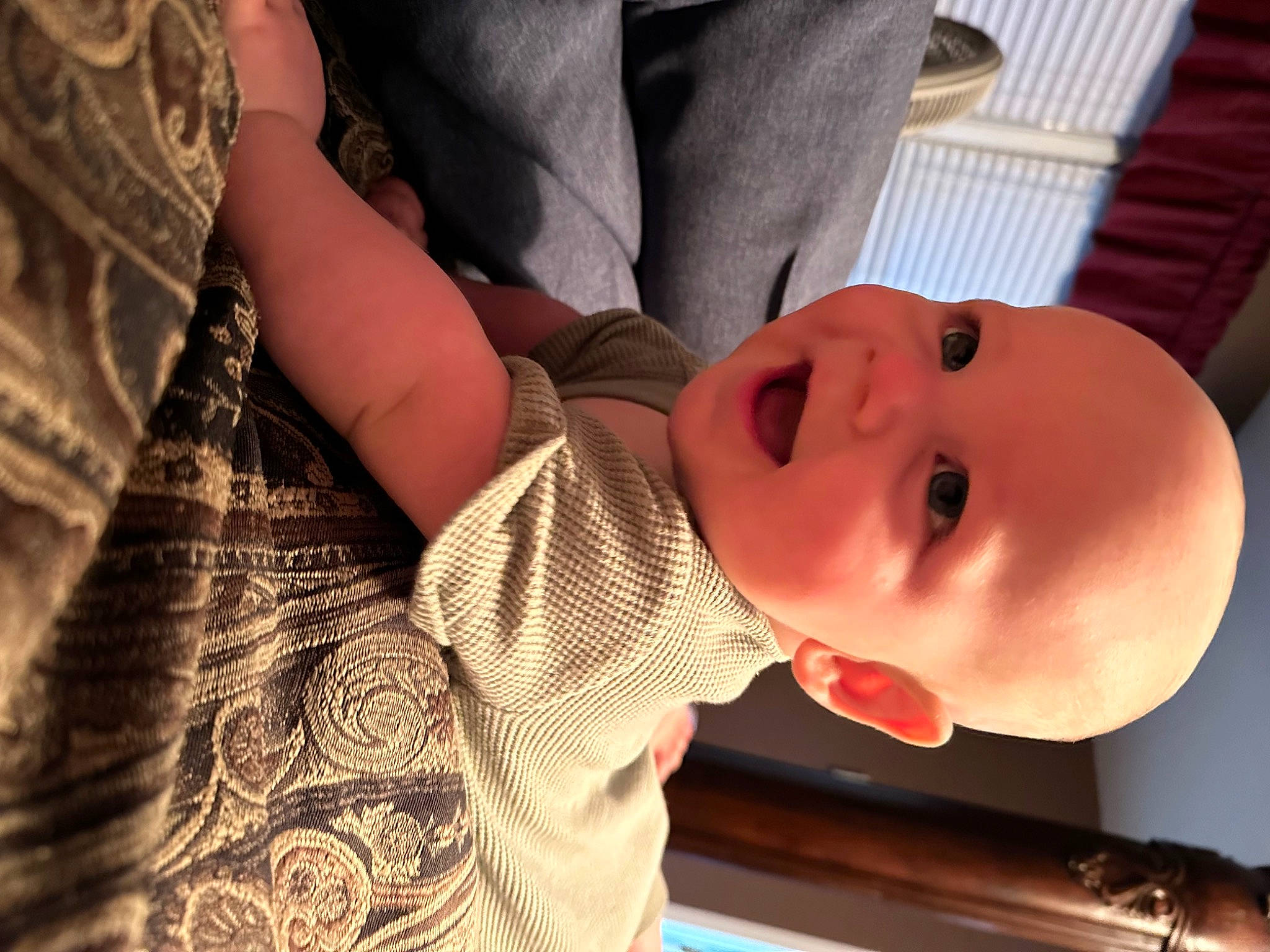 Brigdon is registered to the contest to win money with this photo: abdomen, baby, baby_toddler_clothing, cheek, child, comfort, eyelash, fun, gesture, happy, hat, lip, mouth, nose, pattern, person, plaid, sitting, skin, sleeve