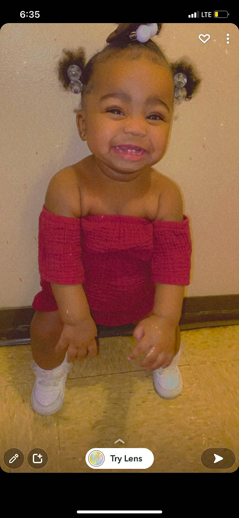 Ava is registered to the contest to win money with this photo: abdomen, baby_toddler_clothing, cheek, chest, dress, face, finger, flooring, happy, human_leg, joint, joy, knee, neck, person, skin, sleeve, smile, thigh, thumb