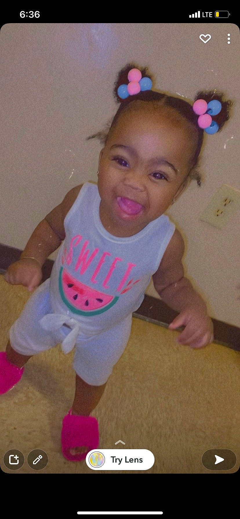 Ava is registered to the contest to win money with this photo: baby_toddler_clothing, cheek, child, chin, face, facial_expression, fun, hair, hairstyle, happy, head, iris, person, pink, skin, sleeve, smile, standing, thigh, thumb