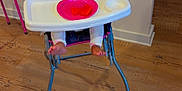Heaven joined the competition — help win amazing prizes! child, toddler, high_chair, pink, blue, plate, watermelon, food, pajamas, curly_hair, indoor, wooden_floor, white_wall, feet, hands, expression, person, furniture, table, seat