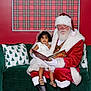 Heaven is registered to the contest to win money with this photo: book, boots, celebration, child, christmas, curly_hair, dress, family, festive, glasses, green_couch, holiday, indoor, pillow, portrait, reading, red_carpet, santa_claus, smiling, white_gloves
