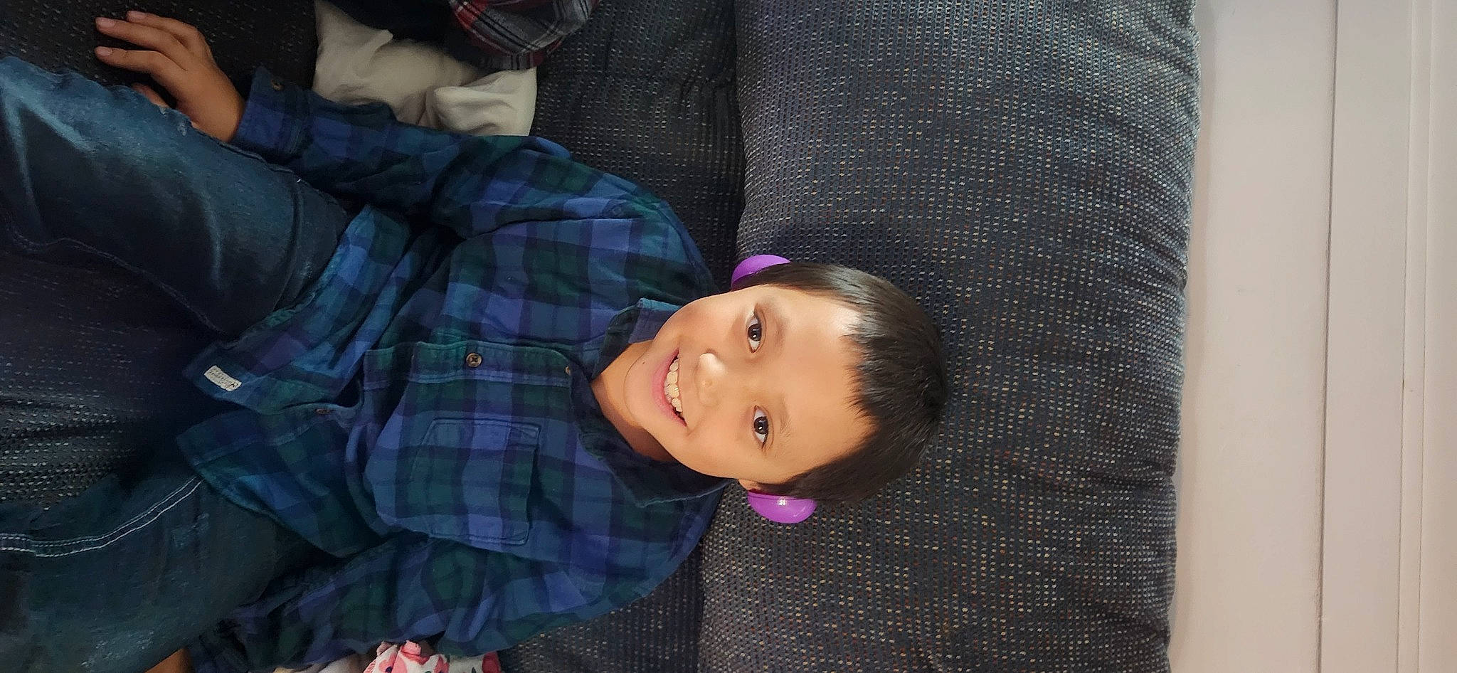 Jacob is registered to the contest to win money with this photo: baby_toddler_clothing, cheek, child, comfort, electric_blue, happy, head, joy, pattern, person, plaid, sleeve, smile, tartan, textile, toddler