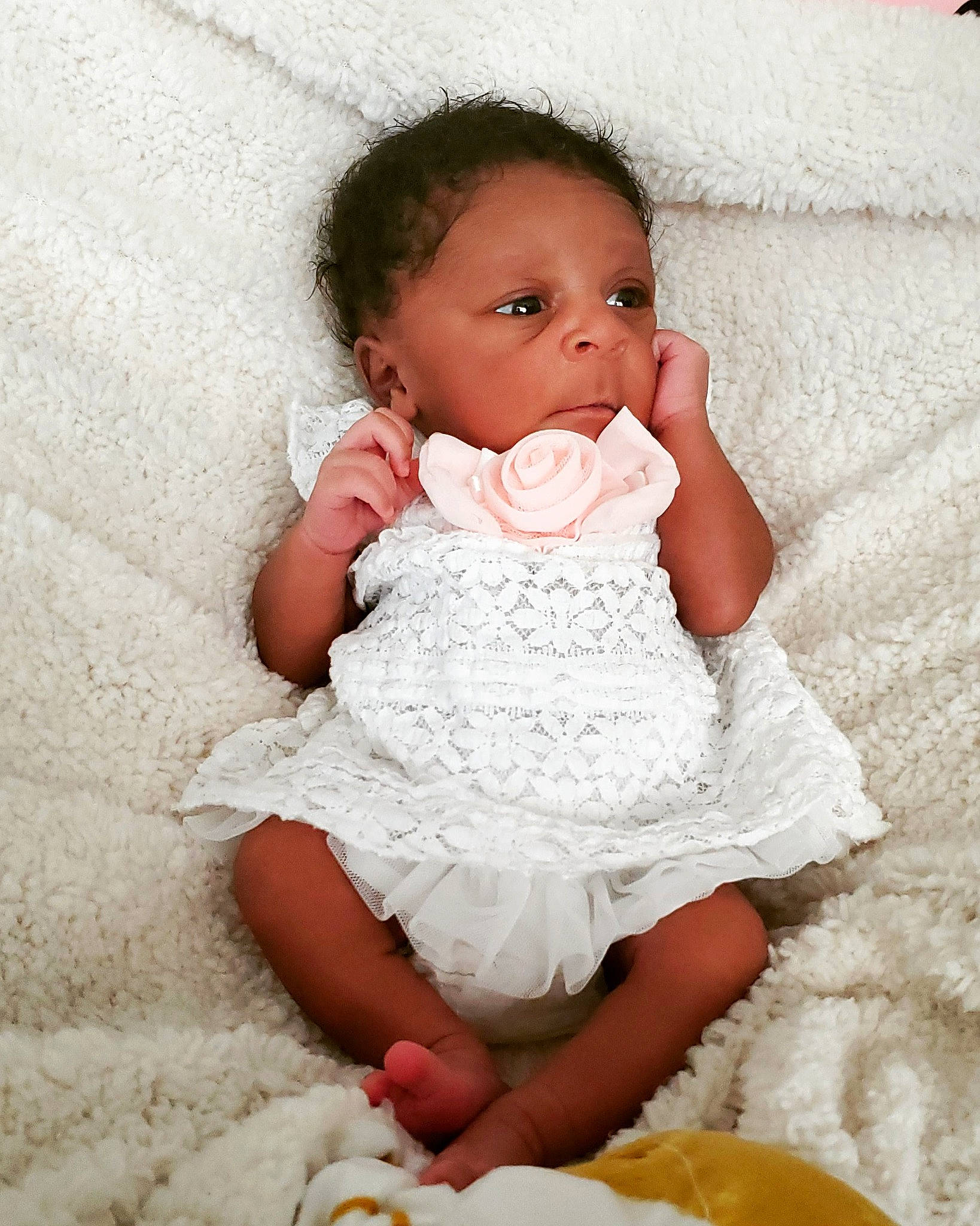 Olive is registered to the contest to win money with this photo: arm, baby, baby_toddler_clothing, cheek, clothing, dress, eye, face, flash_photography, hair, hand, happy, head, human_body, iris, leg, neck, person, skin, sleeve