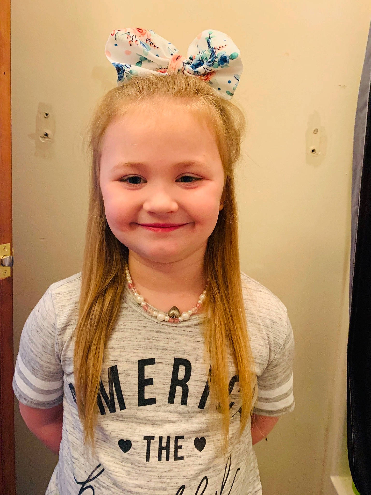Aaliyah joined the competition — help win amazing prizes! chin, dress, ear, eyebrow, eyelash, fun, gesture, hairstyle, happy, headband, headpiece, jewellery, joy, long_hair, neck, person, sleeve, sleeveless_shirt, smile, t_shirt