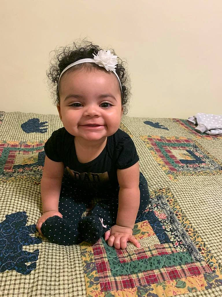 Tatiana joined the competition — help win amazing prizes! baby, baby_toddler_clothing, child, eye, face, floor, flooring, fun, happy, head, headband, headpiece, iris, joy, linens, pattern, person, skin, sleeve, smile