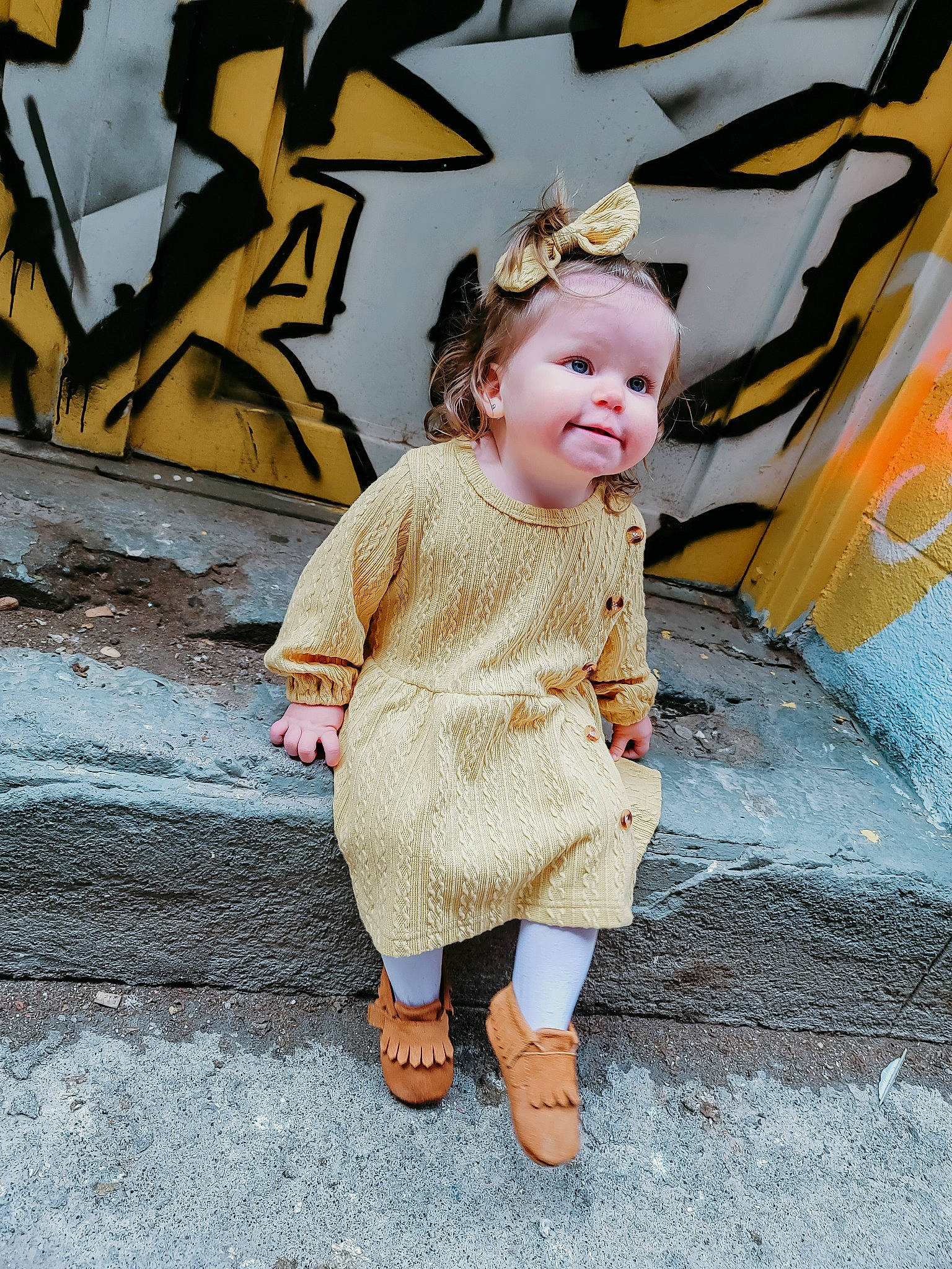Anastyn joined the competition — help win amazing prizes! baby, baby_toddler_clothing, child, dress, fashion_accessory, fashion_design, fun, happy, hat, headpiece, jewellery, pattern, people_in_nature, person, sandal, sitting, skin, smile, toddler, tradition