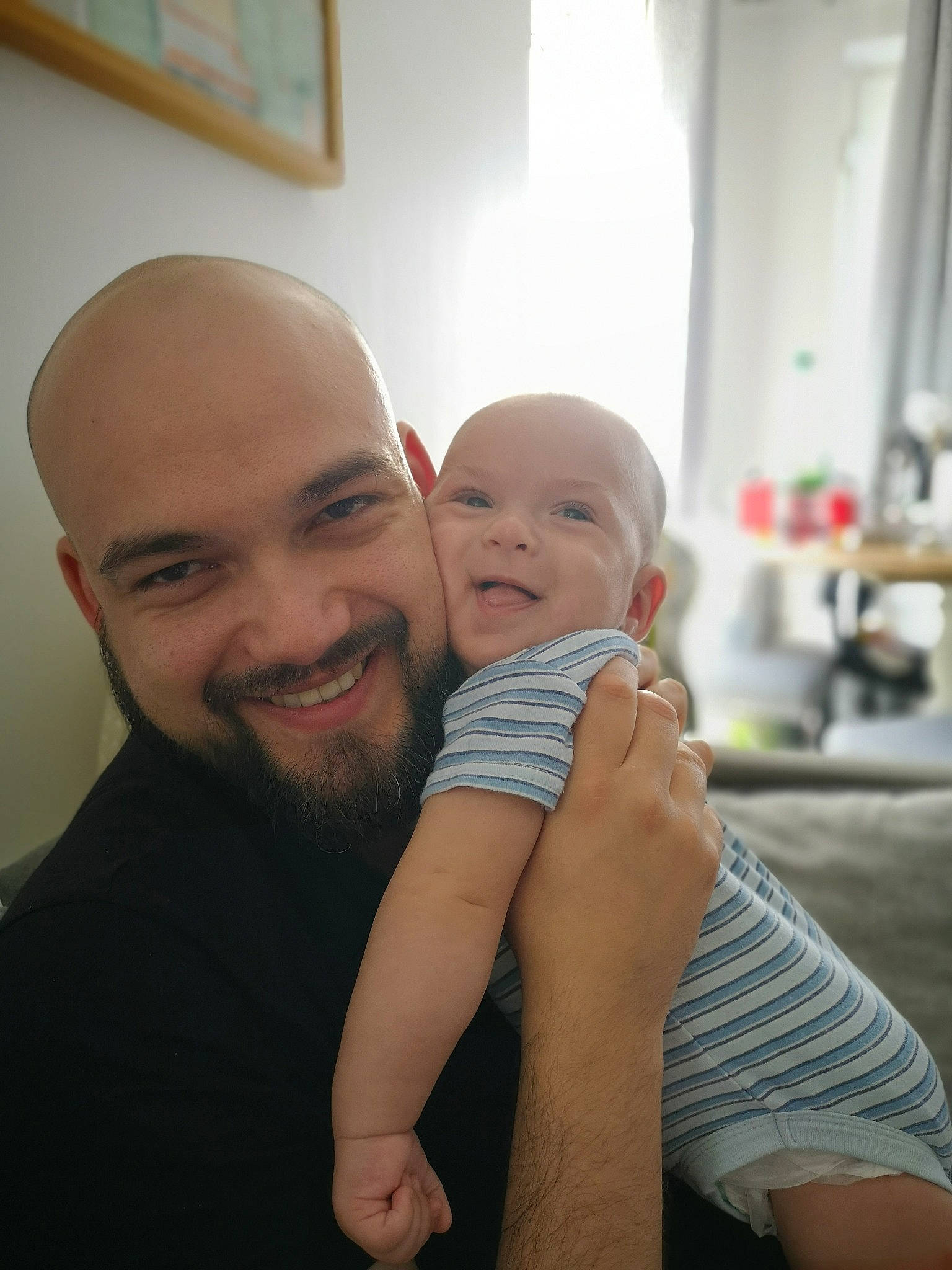 Sasha is registered to the contest to win money with this photo: arm, baby, cheek, child, face, facial_hair, father, finger, fun, hand, head, joint, joy, leg, male, nose, people, person, skin, smile