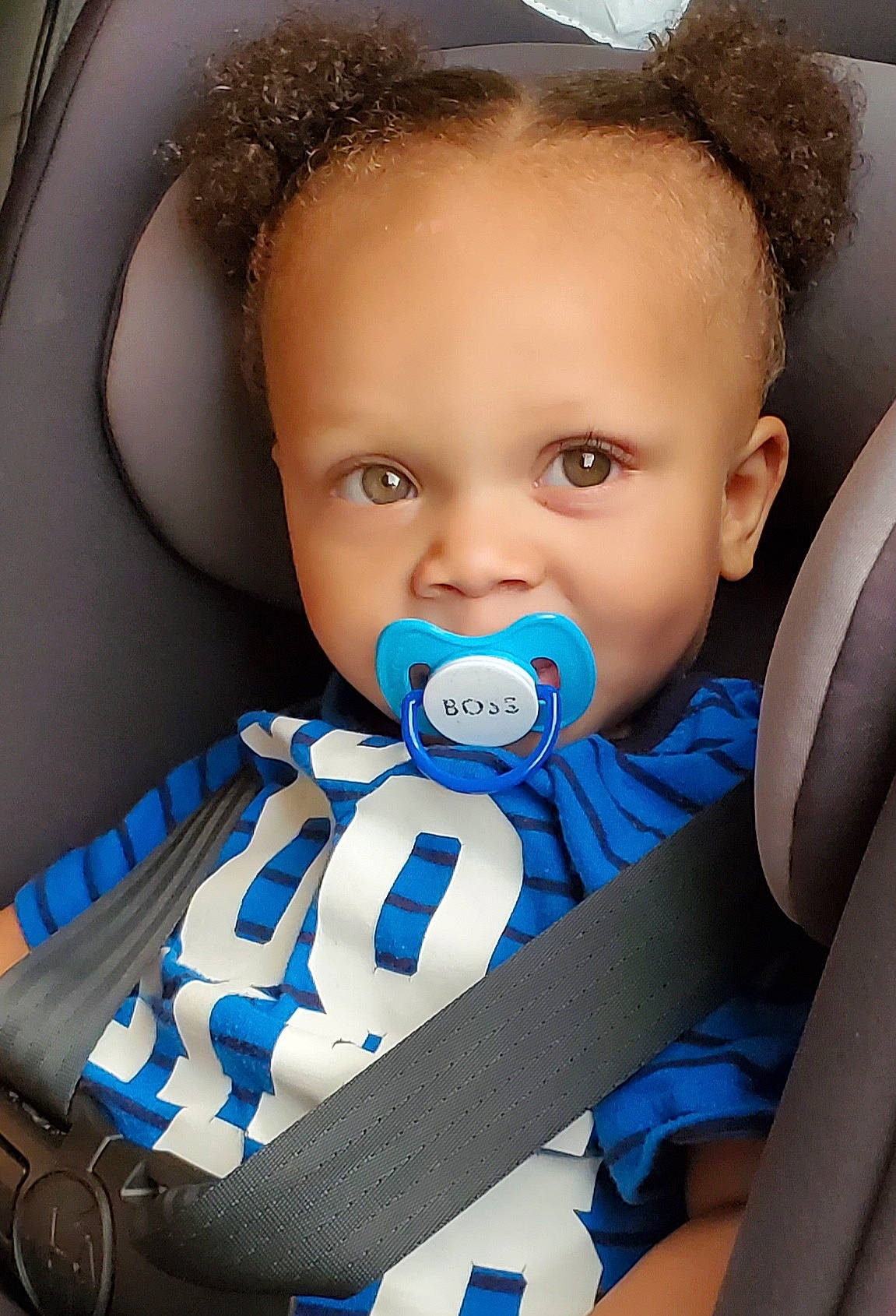 Bryon...butterfinger is registered to the contest to win money with this photo: baby, baby_in_car_seat, baby_products, baby_toddler_clothing, blue, car_seat, cheek, child, ear, mouth, person, product, toddler