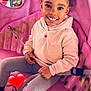 Cataleya a rejoint le concours — aidez-le/la à gagner de superbes lots ! boots, child, colorful, cute, girl, hair_beads, happy, heart_emoji, hoodie, indoor, leggings, pink, playful, playground, portrait, seatbelt, smiling, toy_story, window, woody