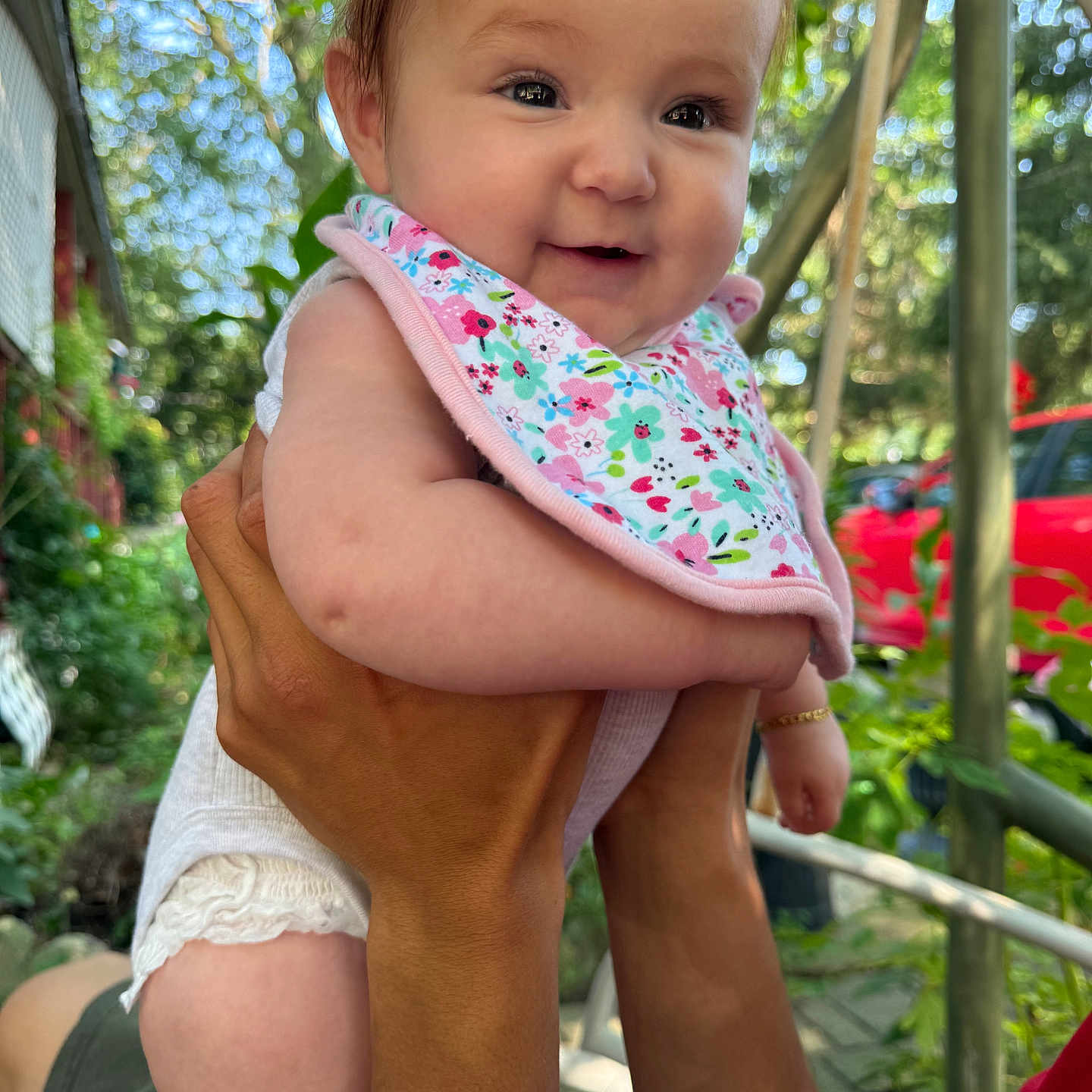 Yaslena joined the competition — help win amazing prizes! arm, baby, bib, car, child, clothing, daylight, face, greenery, hands, happy, holding, infant, nature, outdoor, person, playful, portrait, skin, smiling