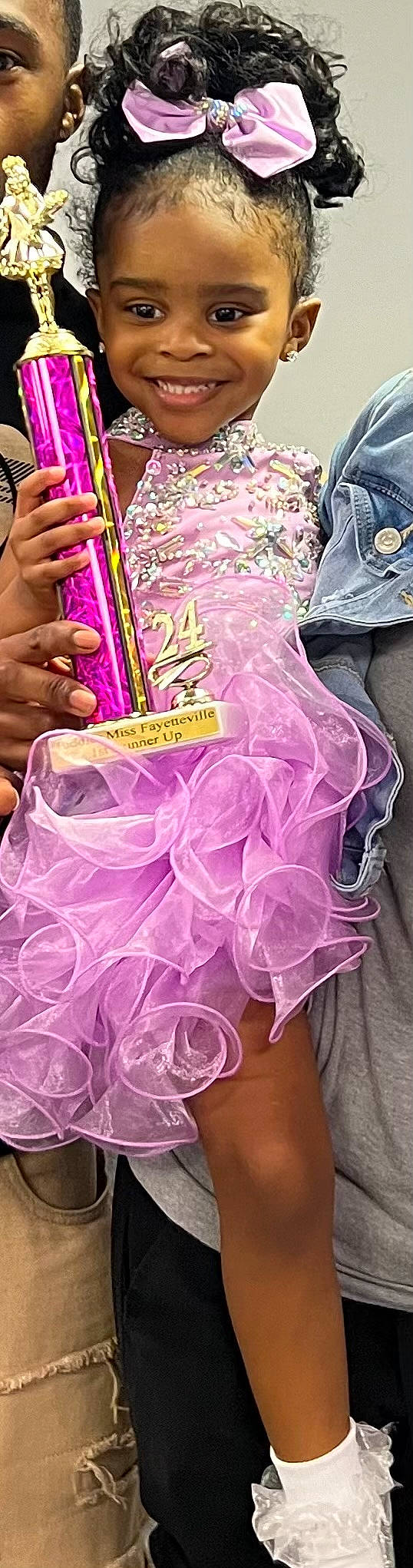 Kori is registered to the contest to win money with this photo: fashion_accessory, finger, flesh, font, food, human_leg, joy, magenta, nail, person, pink, plastic, purple, ribbon, sleeve, transparency, vegetable, wind_instrument, woodwind_instrument