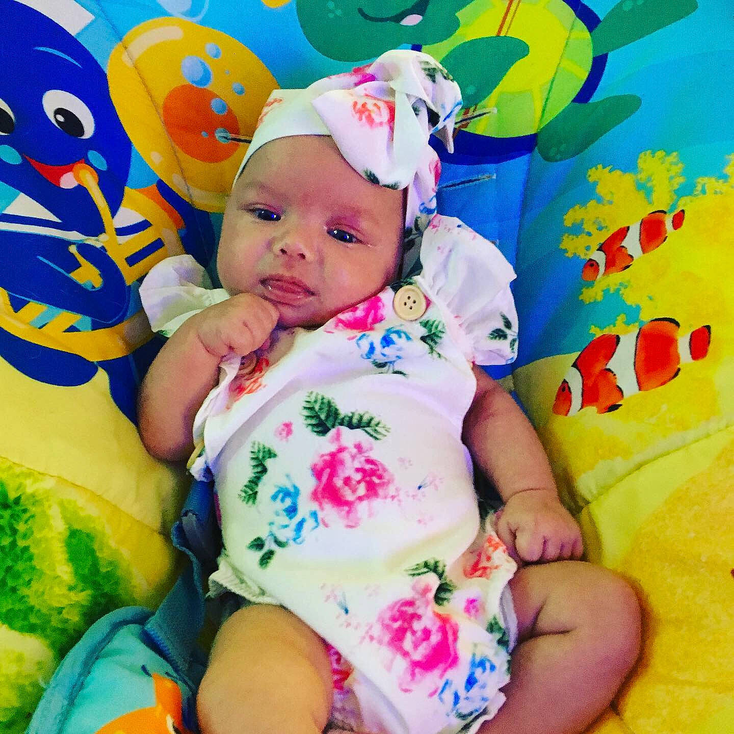 Roselyn is registered to the contest to win money with this photo: baby, baby_products, baby_toddler_clothing, child, happy, person, play, product, smile, toddler, yellow