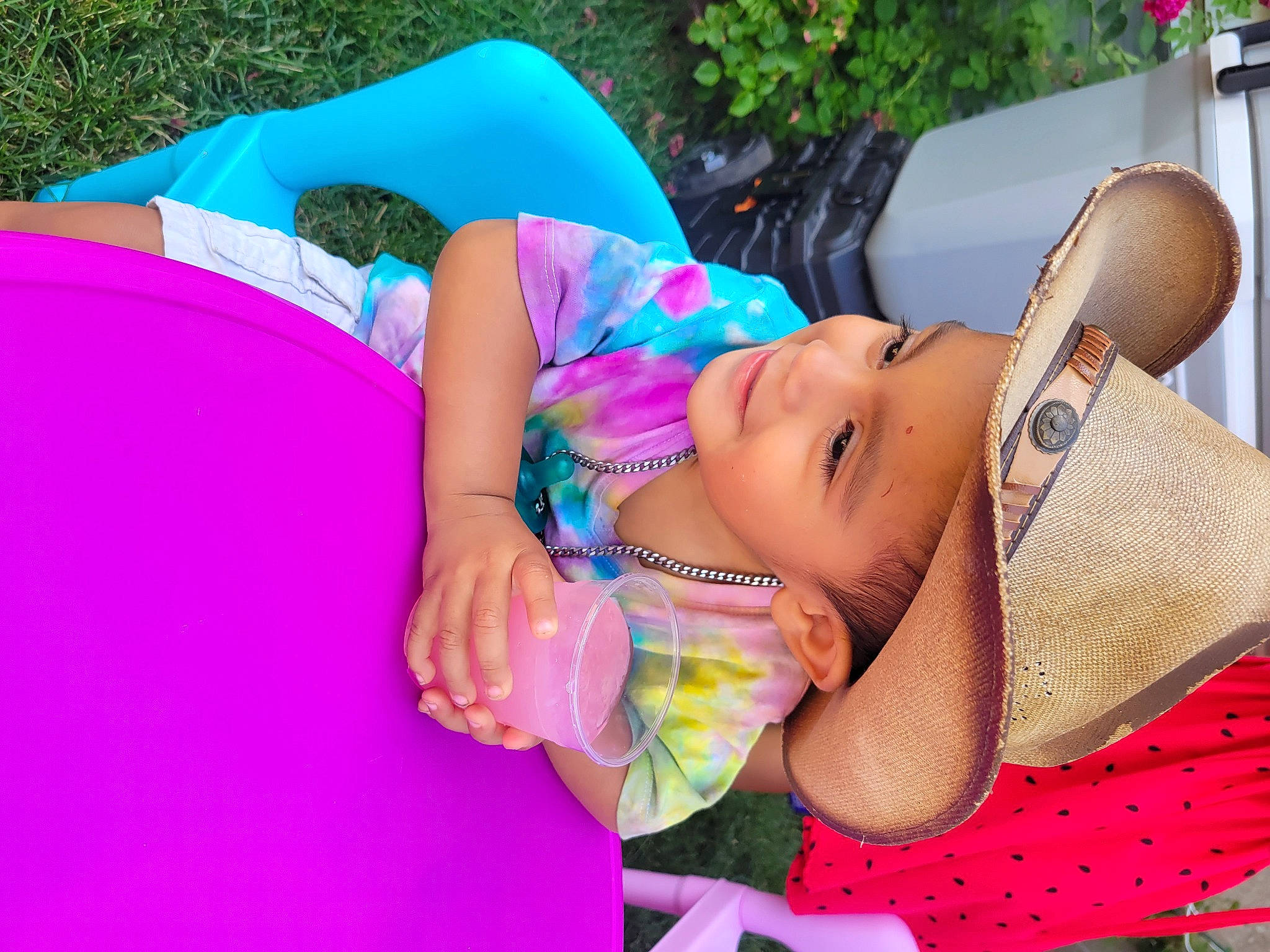 Luis Javier Guzman is registered to the contest to win money with this photo: baby, baby_toddler_clothing, child, comfort, fashion_accessory, fun, grass, happy, hat, headwear, jewellery, joy, leisure, magenta, pattern, person, pink, recreation, sitting, skin