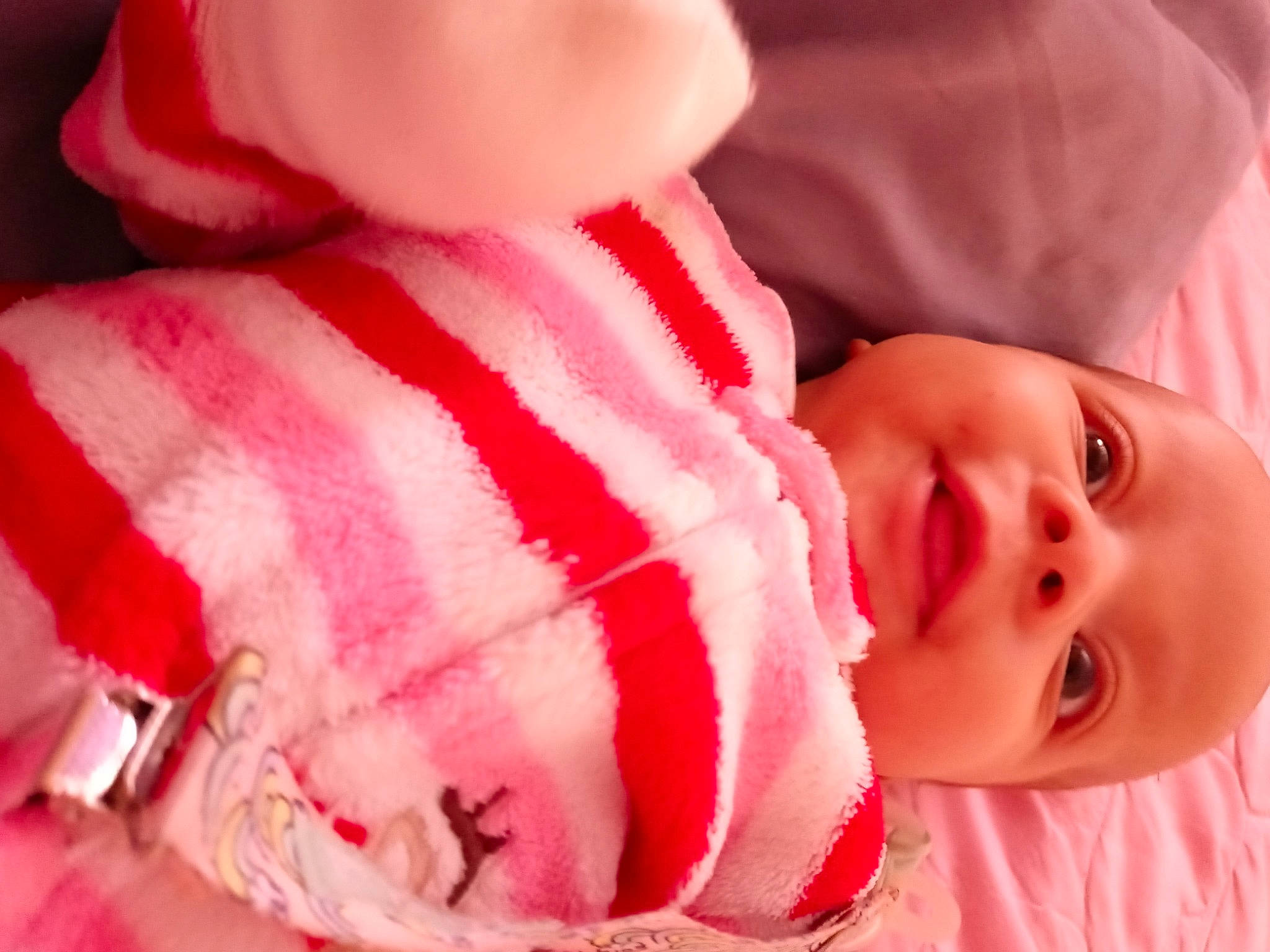 Nariah is registered to the contest to win money with this photo: baby, baby_sleeping, baby_toddler_clothing, cheek, chin, comfort, eyelash, facial_expression, finger, headgear, lip, magenta, mouth, nose, person, pink, red, skin, sleeve, textile