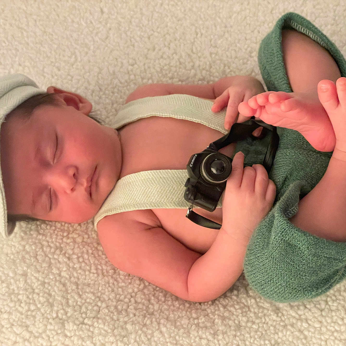 Viyaan joined the competition — help win amazing prizes! accessories, baby, blanket, bodypart, bonnet, camera, cap, clothing, electronics, face, finger, hand, hat, head, newborn, person, photographer, photography, portrait, sleeping