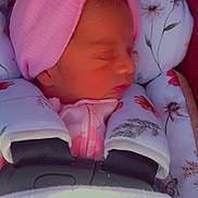 Phoenix is registered to the contest to win money with this photo: newborn, baby, sleeping, headwrap, pink, floral_pattern, baby_carrier, blanket, infant, cute, peaceful, face, child, clothing, resting, portrait, bundle, soft, young, cozy