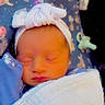 Phoenix is registered to the contest to win money with this photo: newborn, baby, sleeping, blanket, headband, infant, cozy, blue_blanket, patterned_blanket, cute, peaceful, wrapped, child, soft_lighting, indoors, resting, small_face, pink_lips, toddler, baby_clothing