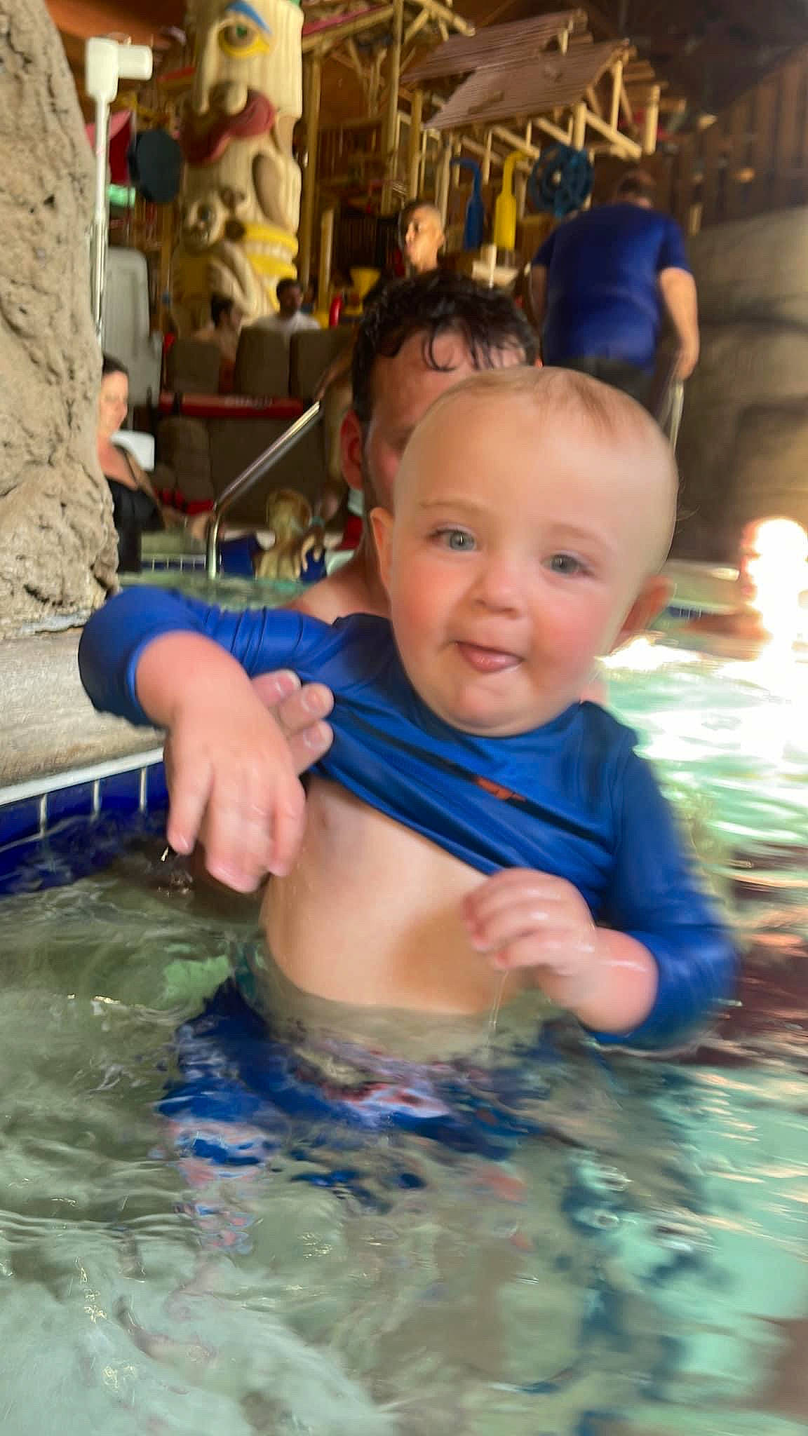 Gavyn is registered to the contest to win money with this photo: baby, bathing, body_of_water, chest, child, fun, happy, hat, indoor_games_and_sports, leisure, mammal, muscle, person, pool, recreation, smile, summer, swimming_pool, toddler, vertebrate