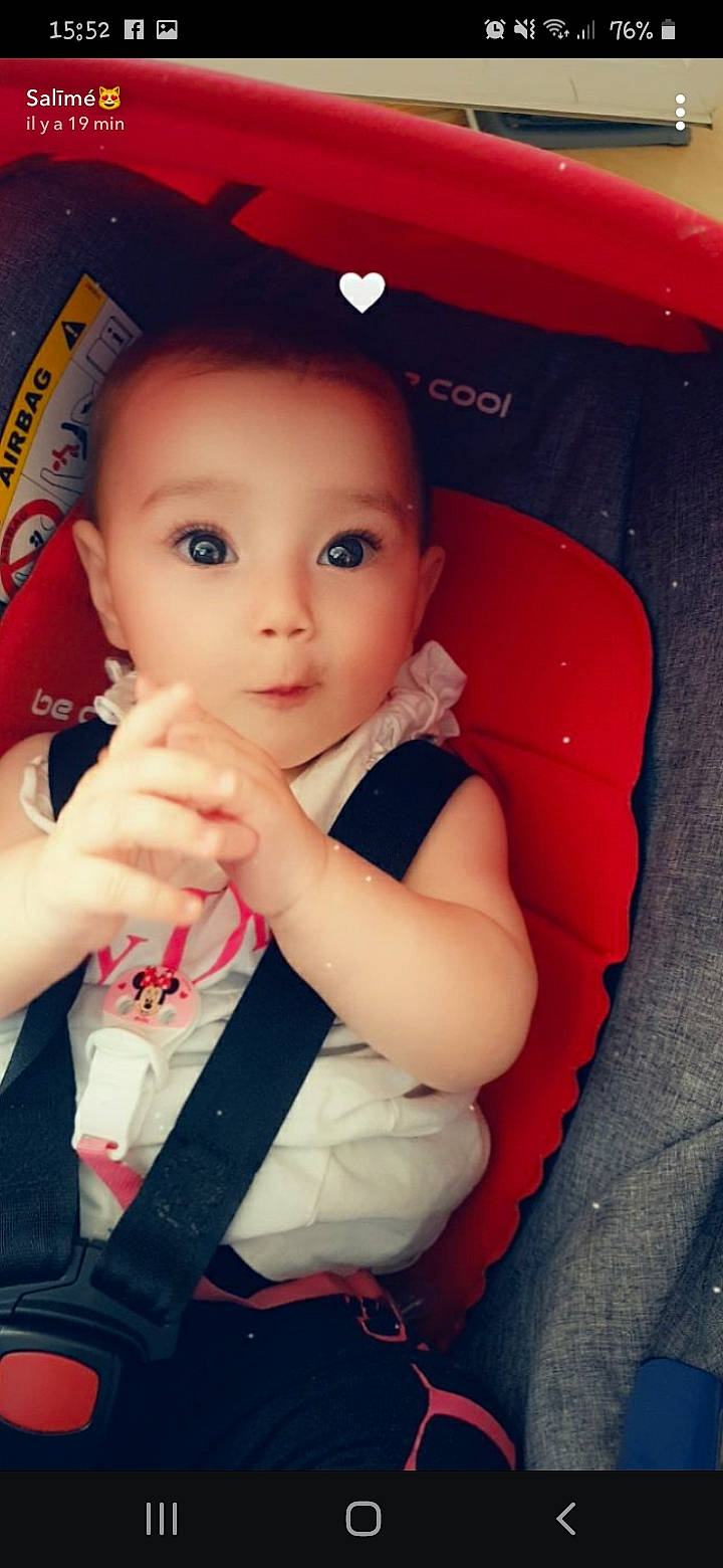 Maïlys participe au concours pour gagner de l'argent avec cette photo : auto_part, automotive_tire, baby, baby_toddler_clothing, cheek, child, cool, eyelash, fashion_accessory, flash_photography, fun, happy, iris, nose, person, sitting, skin, sleeve, thumb, toddler