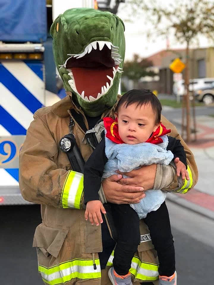 Enrique joined the competition — help win amazing prizes! child, emergency_service, firefighter, fun, person, personal_protective_equipment, toddler