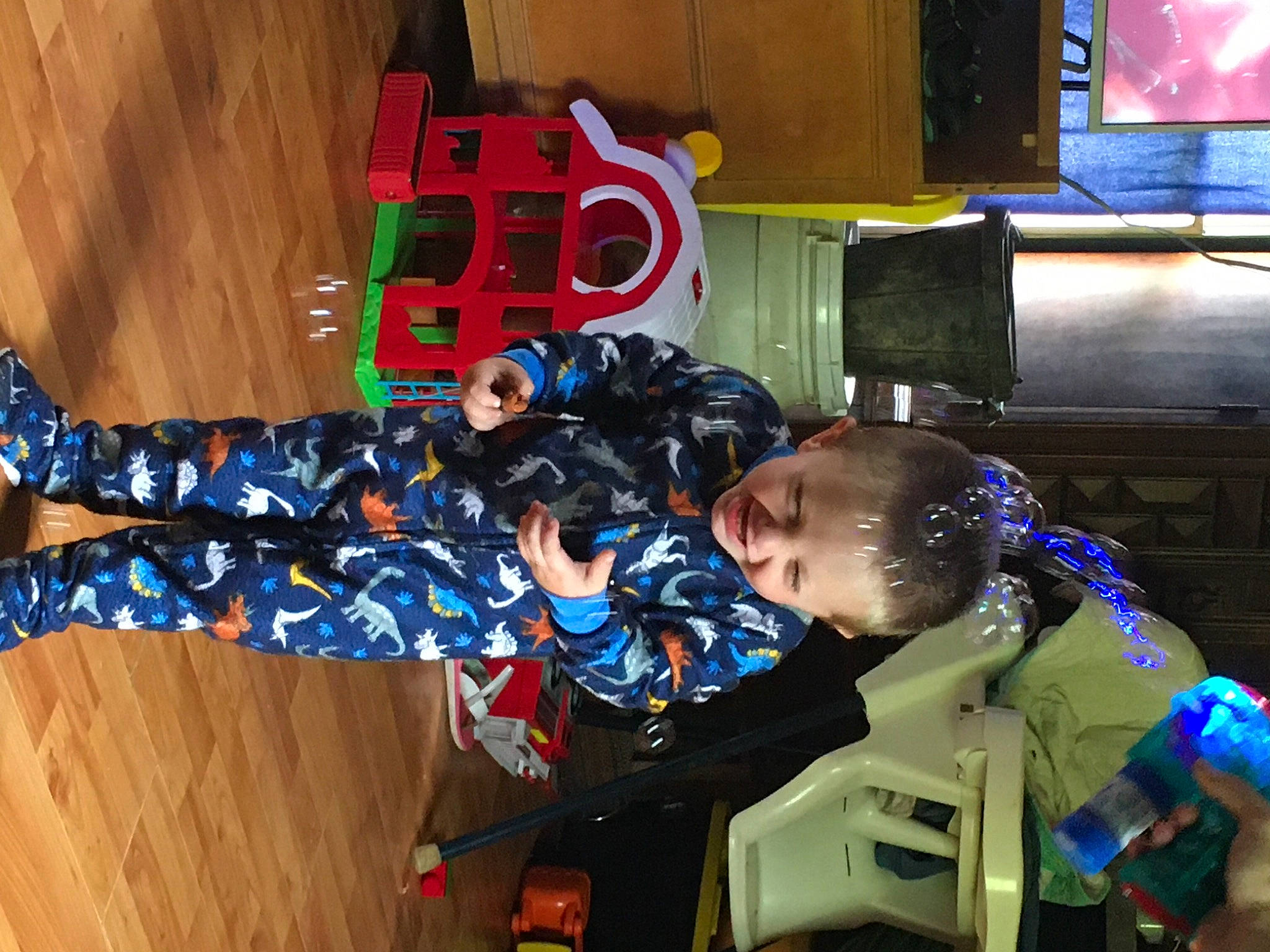 Tucker joined the competition — help win amazing prizes! carmine, display_device, electric_blue, engineering, fictional_character, fun, games, hardwood, helmet, home_appliance, joy, led_backlit_lcd_display, machine, person, personal_protective_equipment, room, service, space, television, toddler