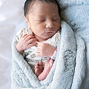Elijah is registered to the contest to win money with this photo: newborn, baby, sleeping, blanket, blue, infant, soft, wrapped, peaceful, hands, feet, cute, cozy, portrait, child, indoors, closeup, skin, resting, toddler