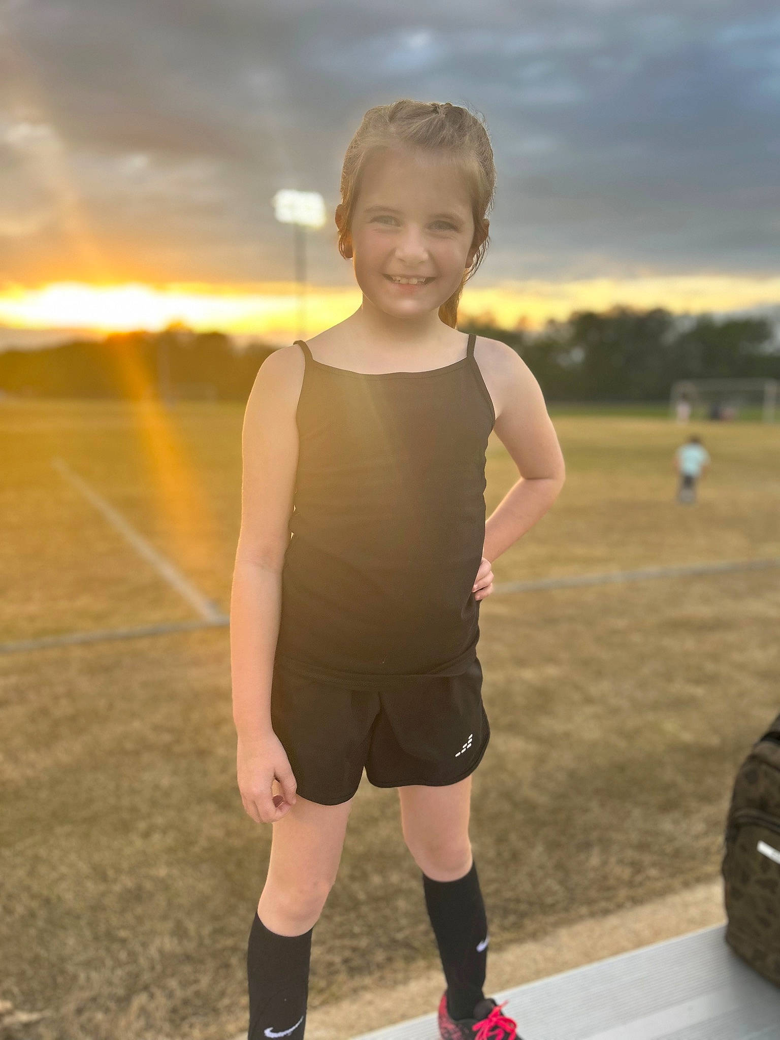 Madolyn joined the competition — help win amazing prizes! blond, cloud, face, flash_photography, fun, grass, happy, human_leg, joy, knee, landscape, leg, person, personal_protective_equipment, player, sky, sleeve, smile, sock, sportswear