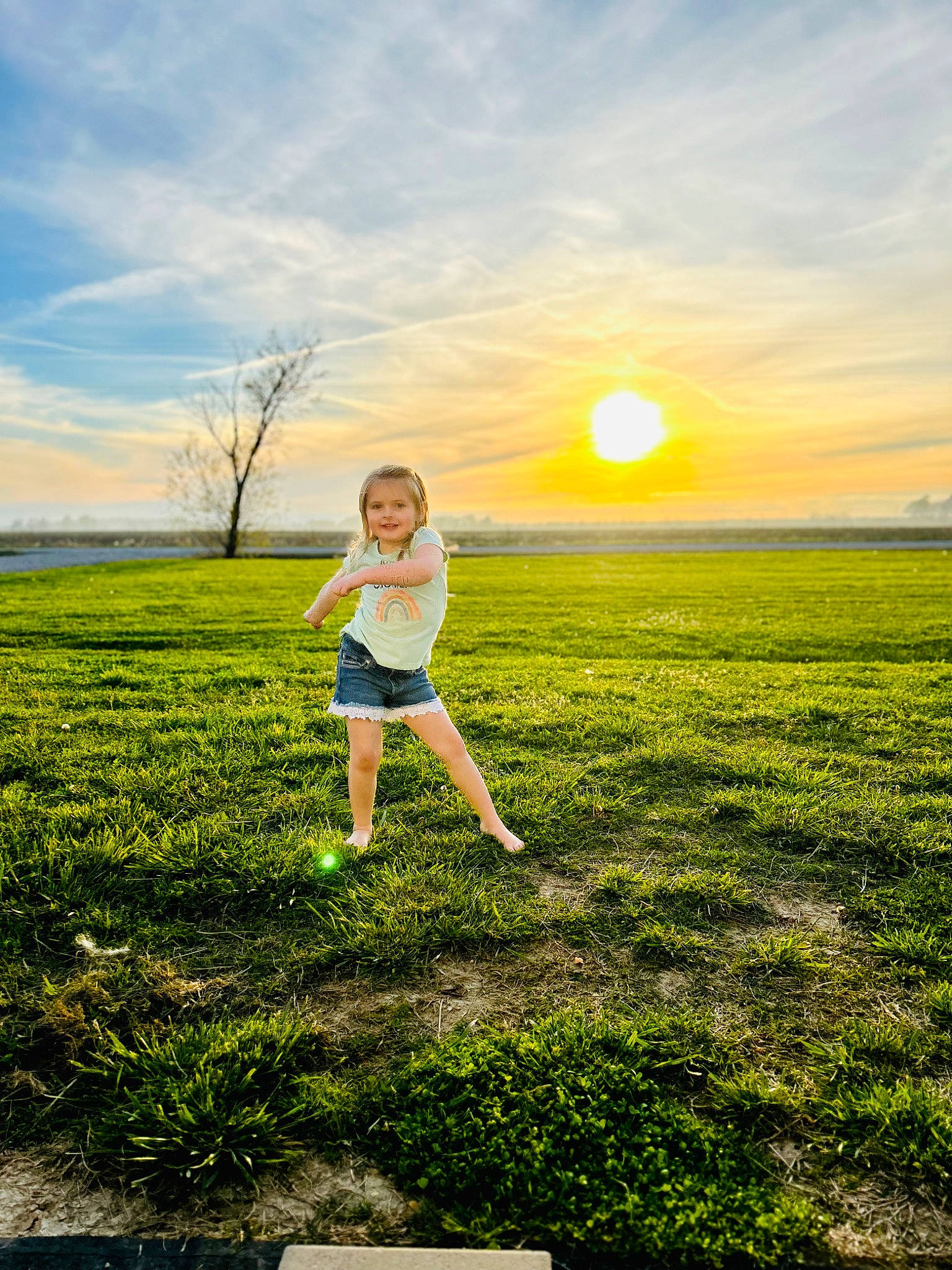 Haisley is registered to the contest to win money with this photo: cloud, flash_photography, fun, gesture, grass, grassland, happy, horizon, joy, landscape, meadow, morning, natural_landscape, people_in_nature, person, plain, plant, rural_area, sky, summer