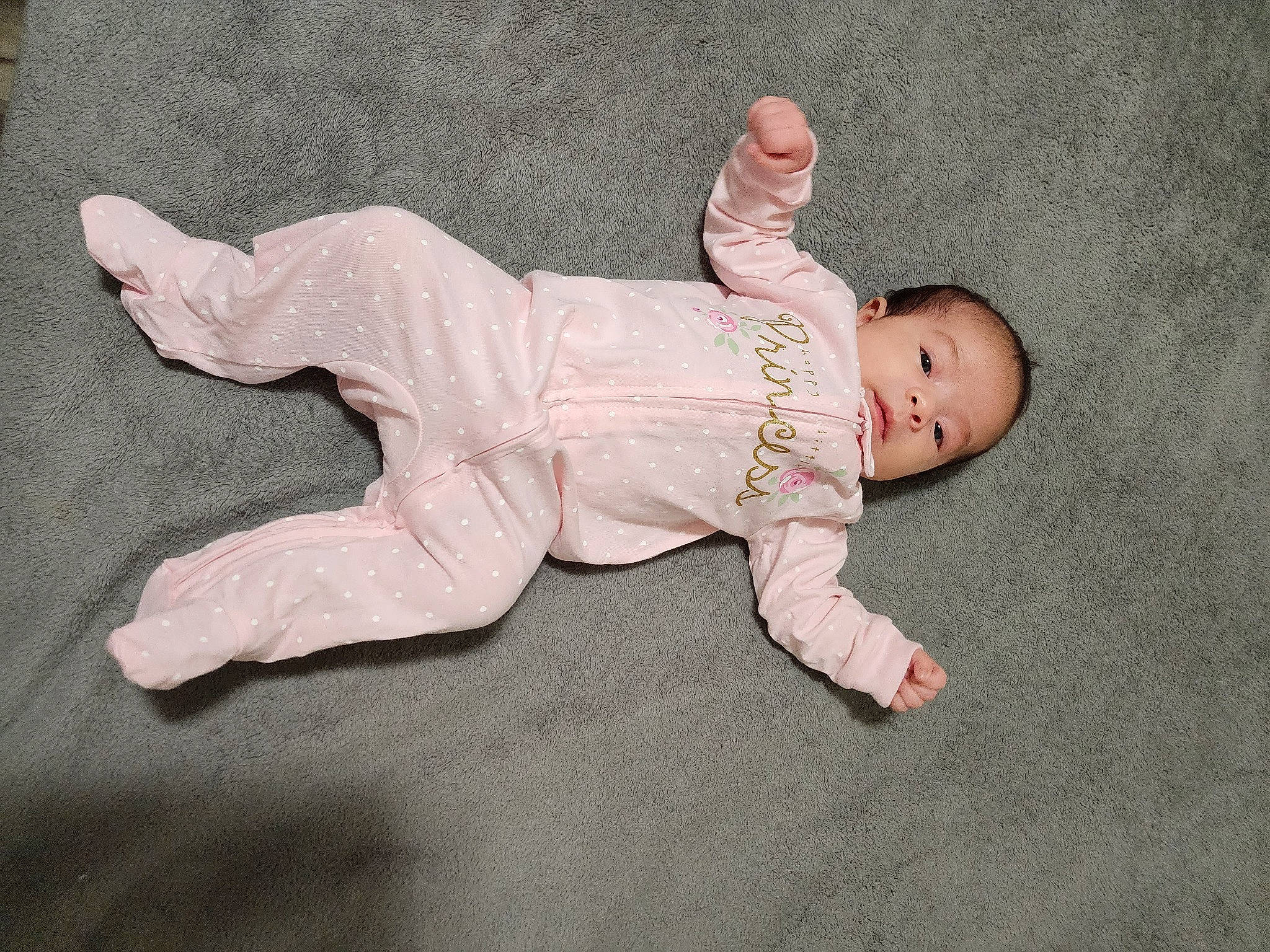 Janet joined the competition — help win amazing prizes! baby, baby_toddler_clothing, barefoot, carmine, child, comfort, face, flooring, foot, head, human_leg, leg, linens, pattern, person, sitting, sleeve, sock, toddler, wood