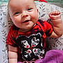 baby, infant, smiling, red_tshirt, kiss_band, purple_blanket, pillow, floral_pattern, cute, happy, indoors, portrait, child, face, hand, skin, clothing, lying_down, cozy, expression