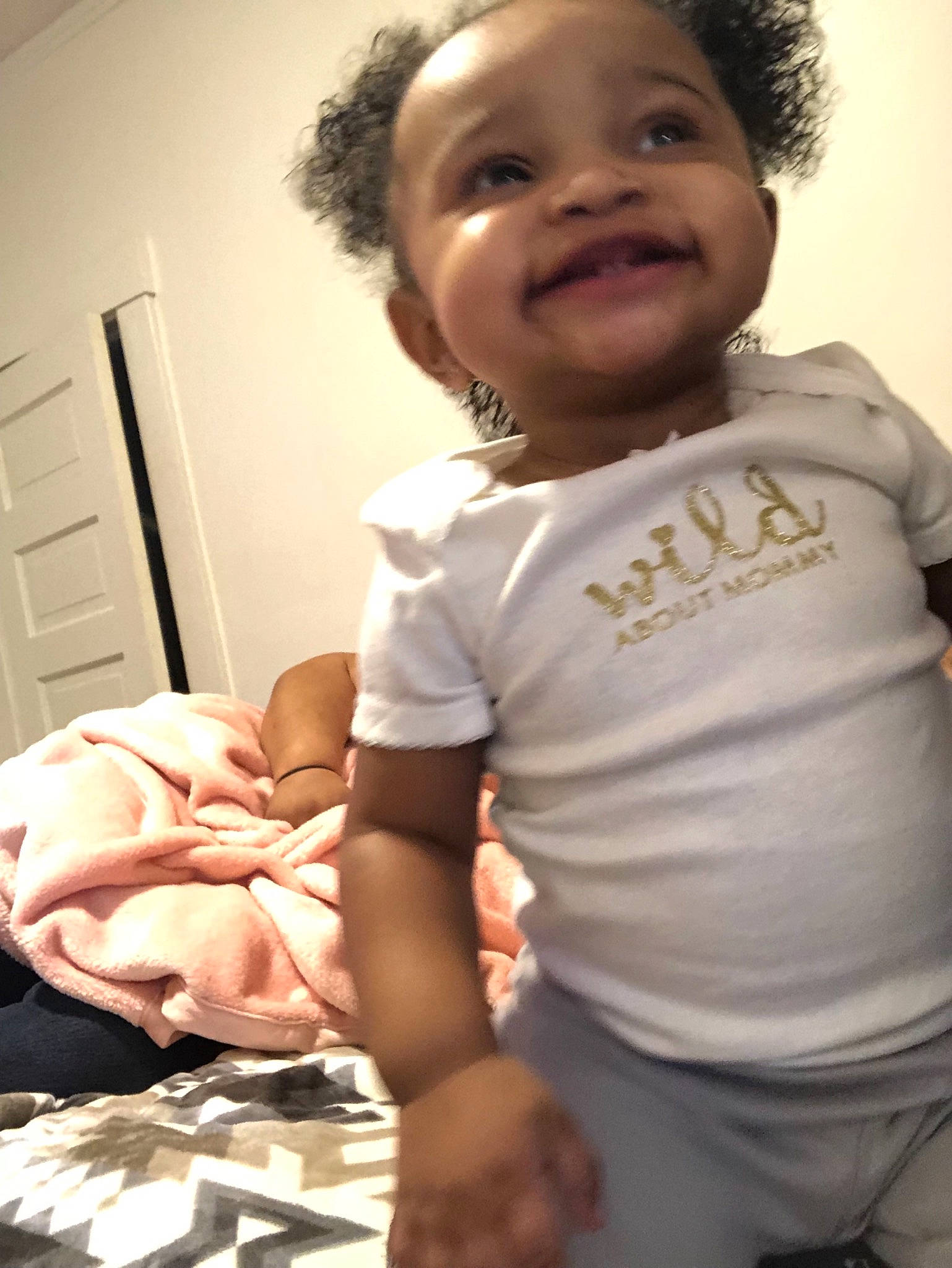 Aubrianna is registered to the contest to win money with this photo: arm, baby, cheek, child, leg, person, sitting, skin, smile, t_shirt, toddler