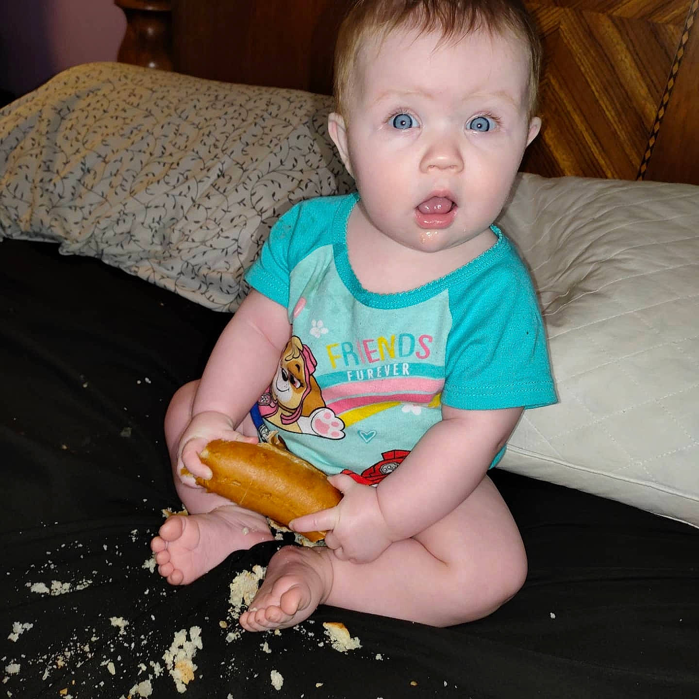 Leela joined the competition — help win amazing prizes! baby, baby_toddler_clothing, child, comfort, comfort_food, couch, eye, finger_food, food, fun, hairstyle, junk_food, lap, mouth, nail, person, sitting, sleeve, surprise, sweetness