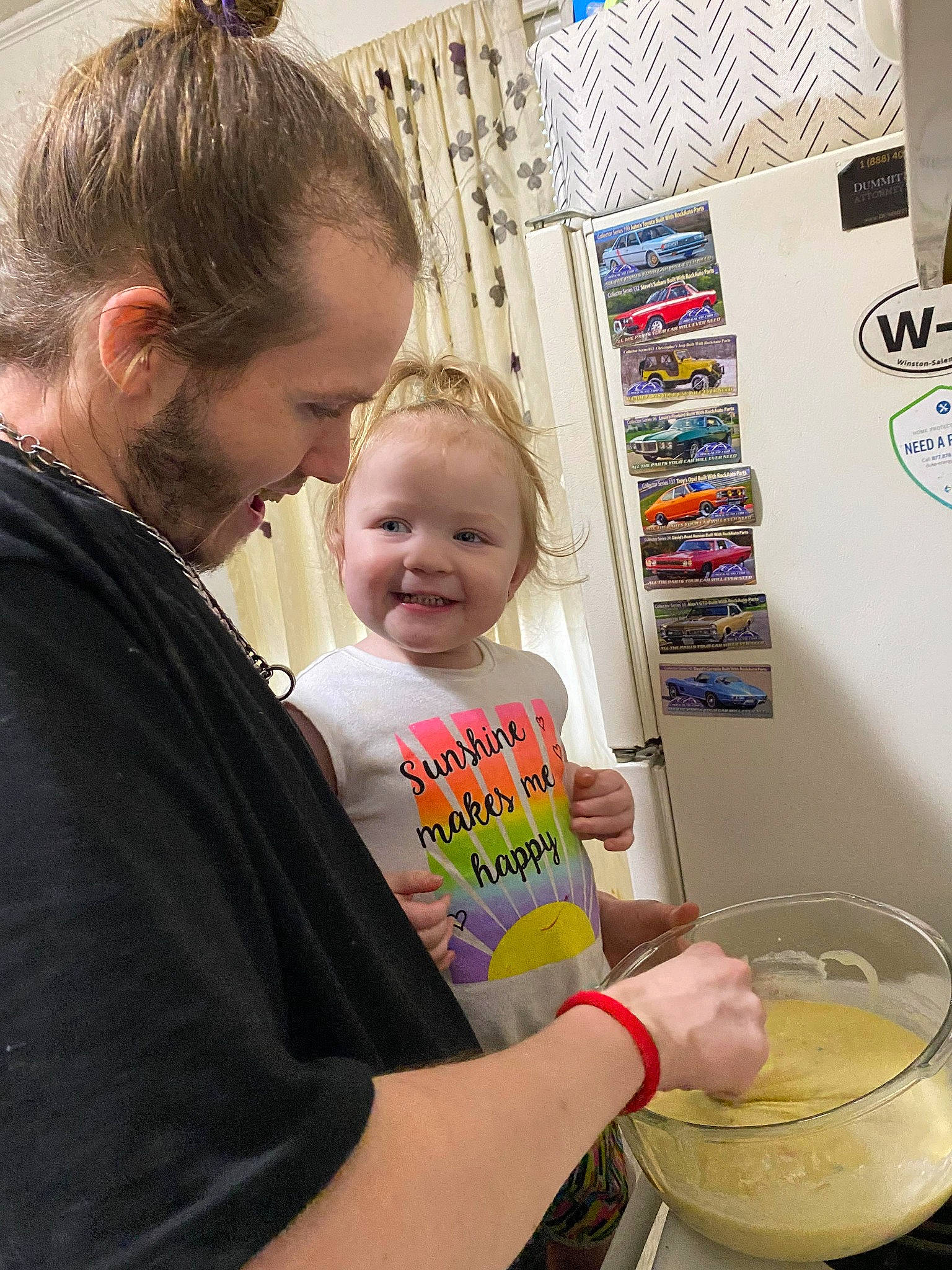 Leela is registered to the contest to win money with this photo: baby, bowl, child, cooking, cuisine, dairy, dish, drink, event, food, fun, hand, happy, ingredient, joy, person, smile, t_shirt, tableware, toddler