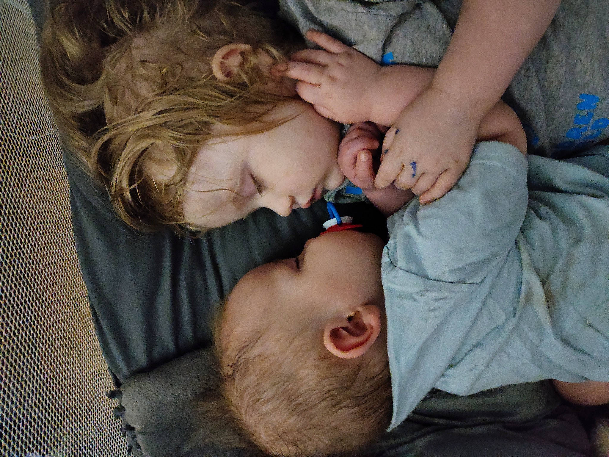 Leela is registered to the contest to win money with this photo: baby, baby_toddler_clothing, blue, cheek, child, comfort, ear, eyelash, finger, fun, gesture, grass, happy, iris, lip, nose, person, skin, smile, toddler