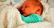 Campbell is registered to the contest to win money with this photo: baby, bed, bedding, blanket, celestial_pattern, child, clouds, cozy, cute, indoors, infant, moon, newborn, peaceful, portrait, resting, sleeping, soft, stars, sun