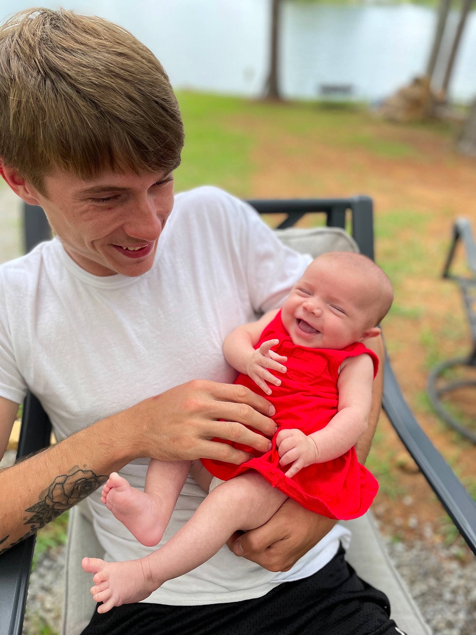 Natalie joined the competition — help win amazing prizes! baby, child, event, face, facial_expression, finger, fun, gesture, grass, hairstyle, hand, happy, joy, leisure, people, people_in_nature, person, recreation, shorts, sitting