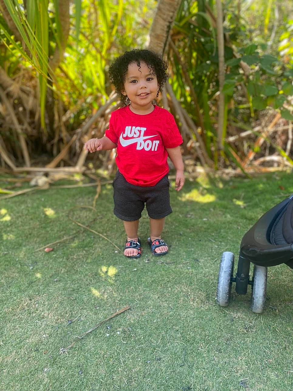 Jacari joined the competition — help win amazing prizes! child, fun, garden, grass, happy, human_leg, joy, leaf, leisure, natural_environment, nature, people_in_nature, person, plant, play, recreation, sandal, shorts, soil, terrestrial_plant