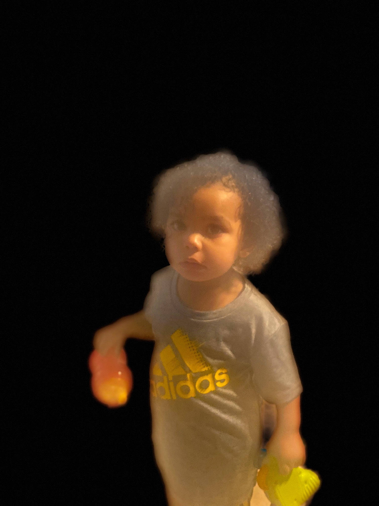 Jacari is registered to the contest to win money with this photo: afro, chest, child, darkness, electric_blue, flash_photography, fun, gesture, happy, person, sleeve, t_shirt, thumb, toddler, toy