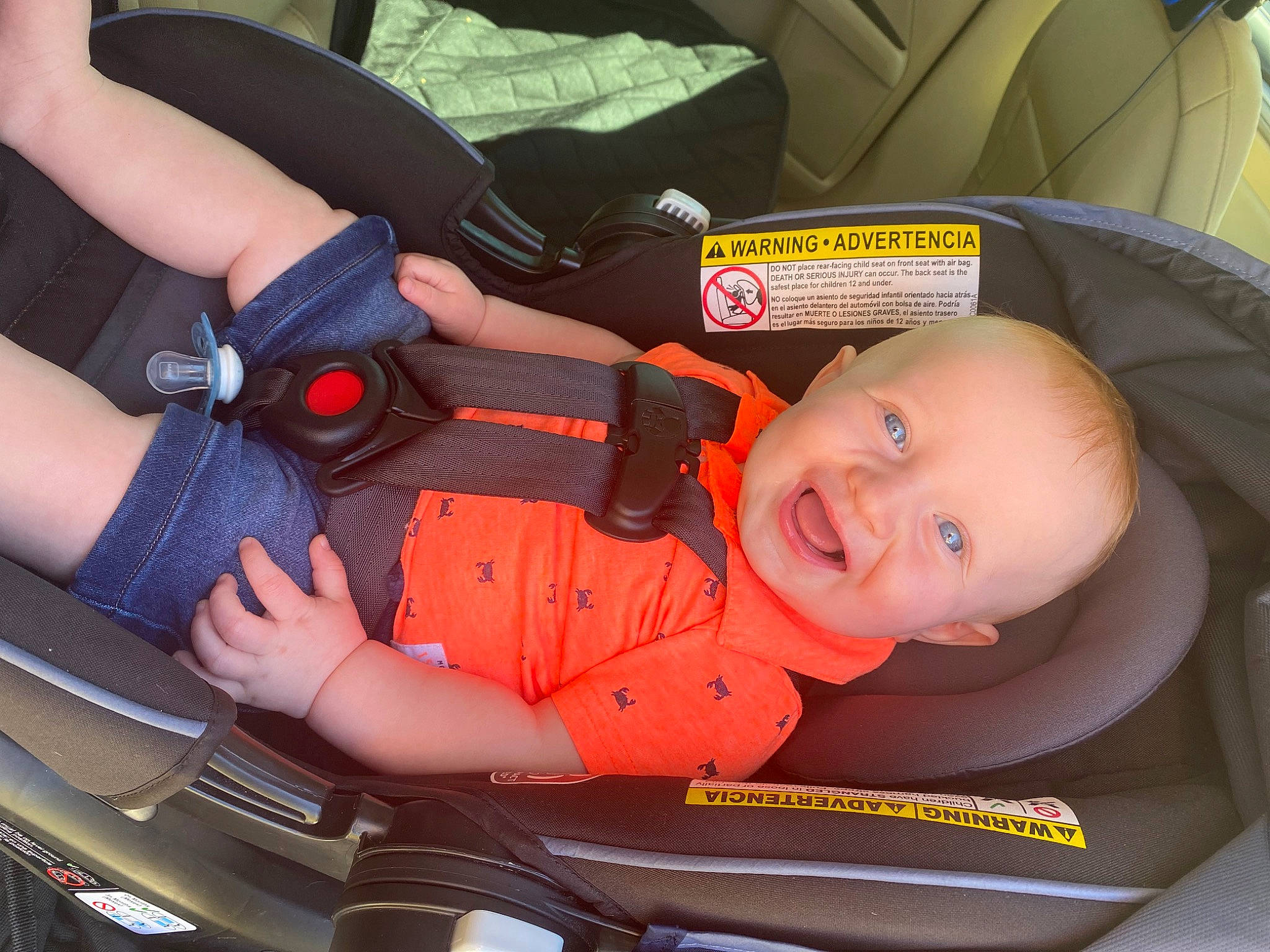 Landyn is registered to the contest to win money with this photo: auto_part, automotive_design, automotive_exterior, automotive_lighting, baby, baby_carriage, bumper, car, car_seat, comfort, hood, light, motor_vehicle, orange, person, smile, toddler, vehicle, vehicle_door, wheel