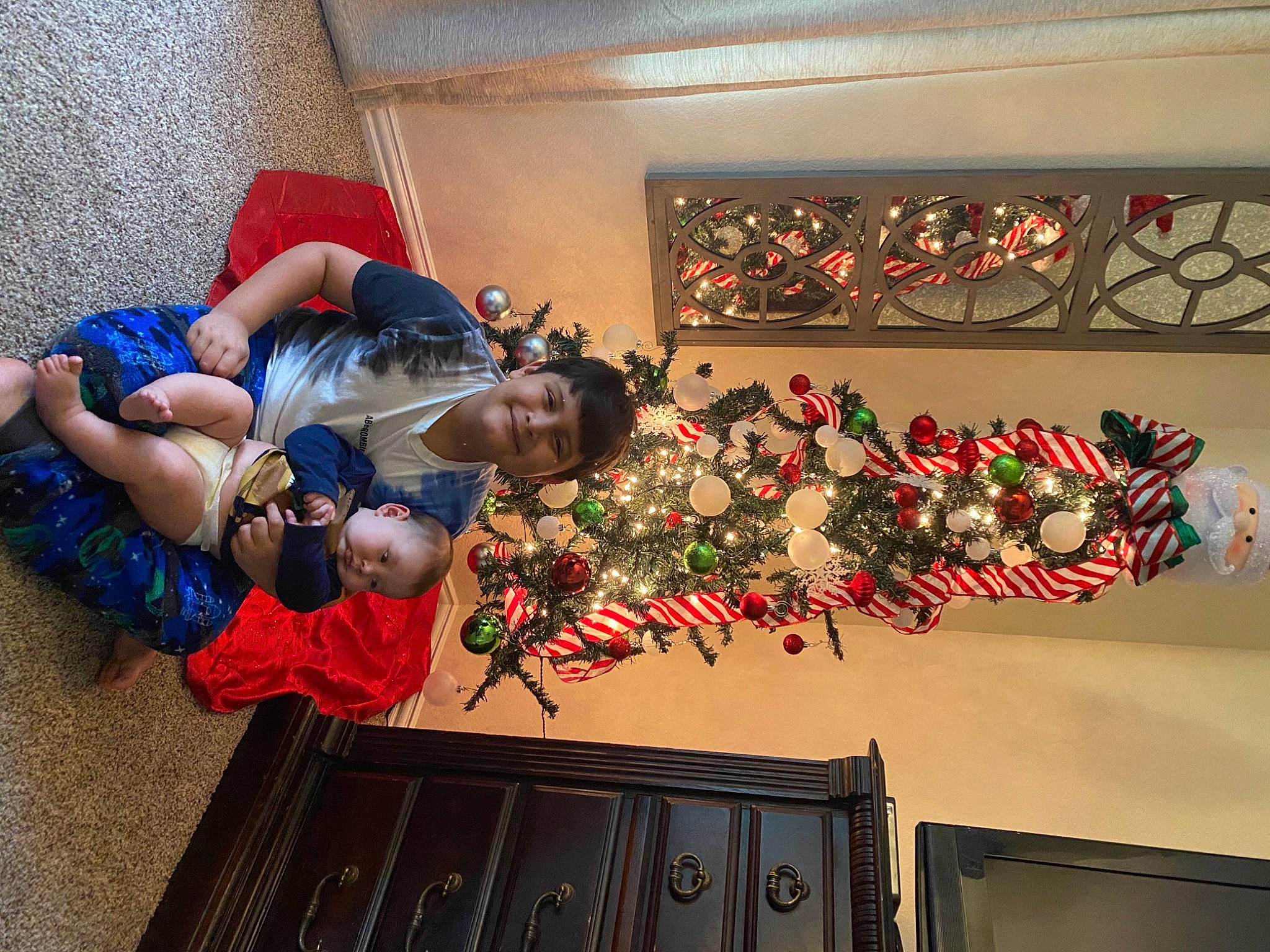 Noah joined the competition — help win amazing prizes! christmas, christmas_decoration, christmas_eve, christmas_ornament, christmas_tree, holiday, holiday_ornament, interior_design, joy, ornament, person, red, tradition