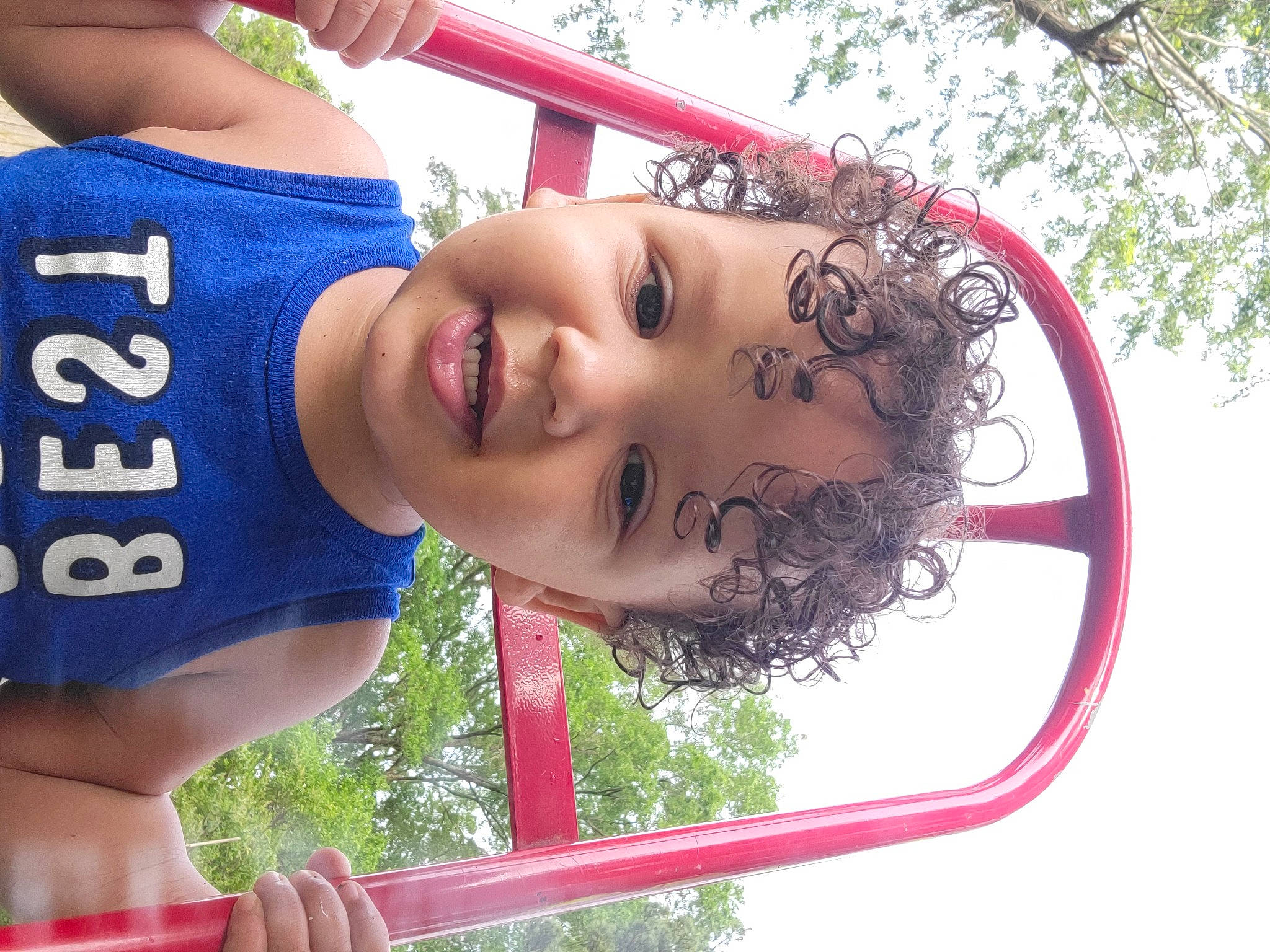 Arquette joined the competition — help win amazing prizes! black_hair, child, cool, fun, grass, green, happy, leisure, people_in_nature, person, photograph, recreation, red, sky, smile, sports_uniform, summer, t_shirt, tree, white