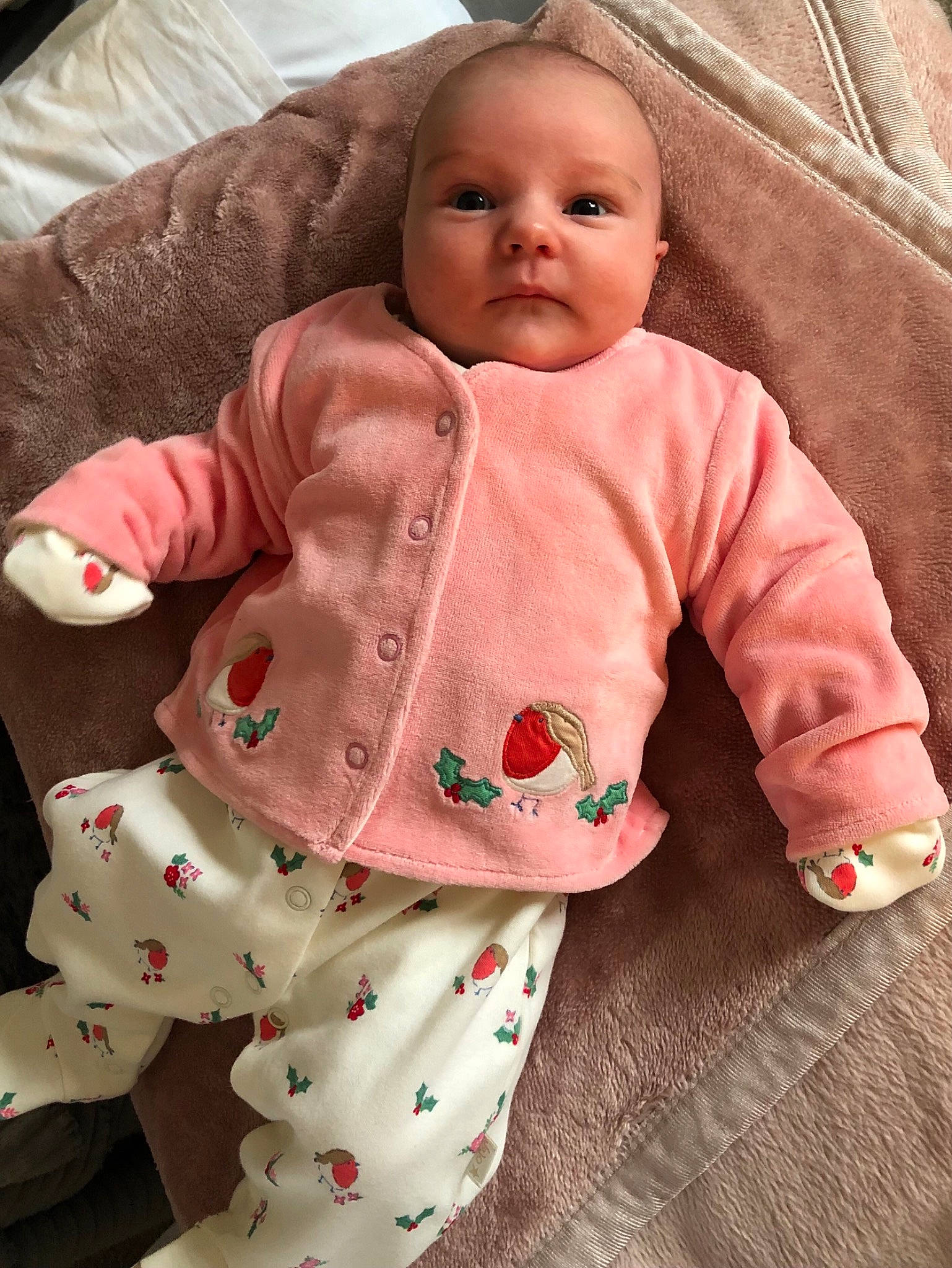 Mae joined the competition — help win amazing prizes! baby, baby_products, baby_safety, baby_toddler_clothing, baby_toys, bib, cheek, child, comfort, linens, nightwear, pattern, peach, person, pink, sitting, skin, sleeve, textile, toddler