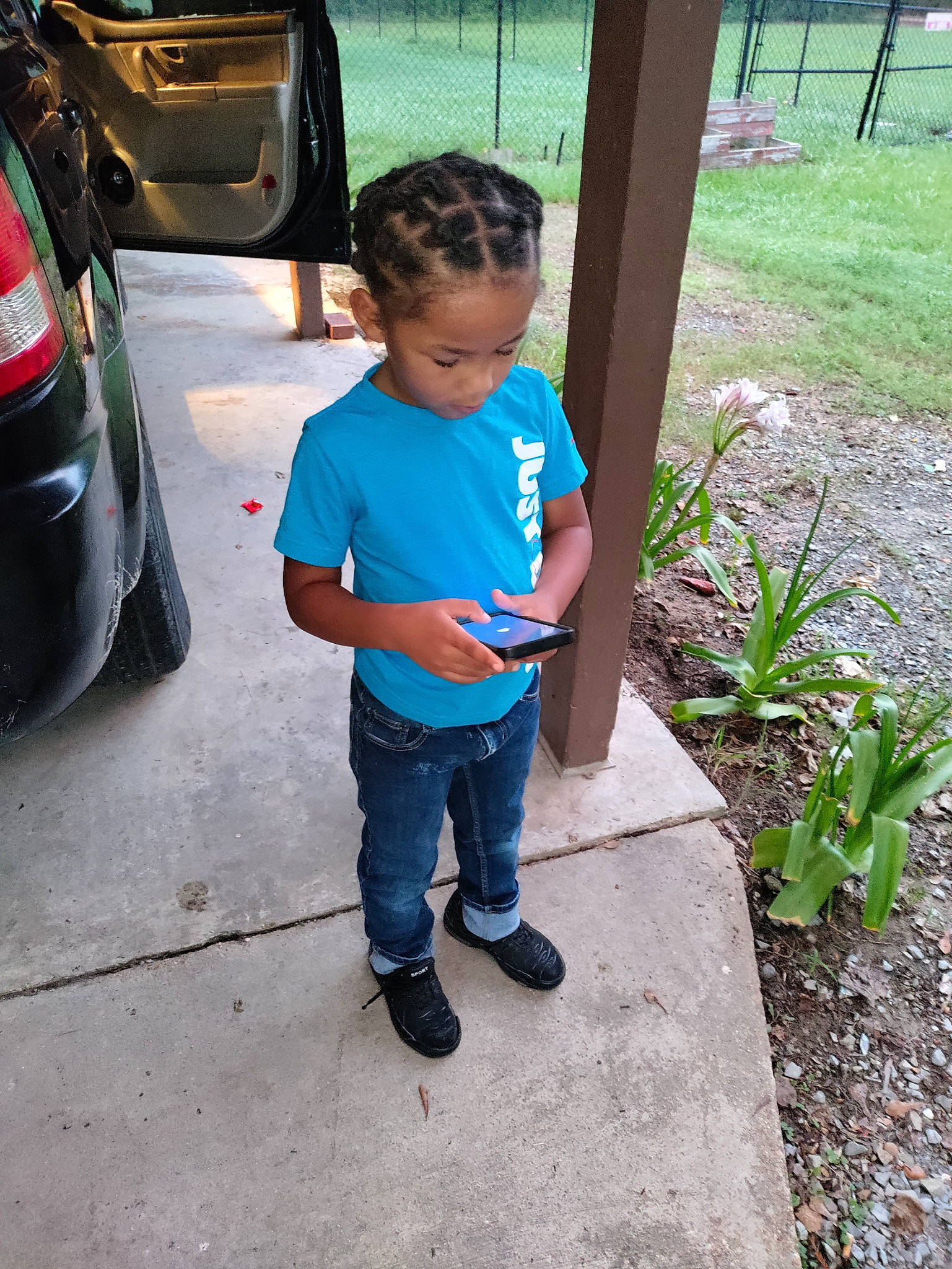 Marcellus joined the competition — help win amazing prizes! asphalt, automotive_design, automotive_exterior, automotive_lighting, automotive_tail_brake_light, automotive_tire, bumper, car, grass, leisure, motor_vehicle, person, personal_luxury_car, plant, sidewalk, t_shirt, toddler, tree, trunk, vehicle