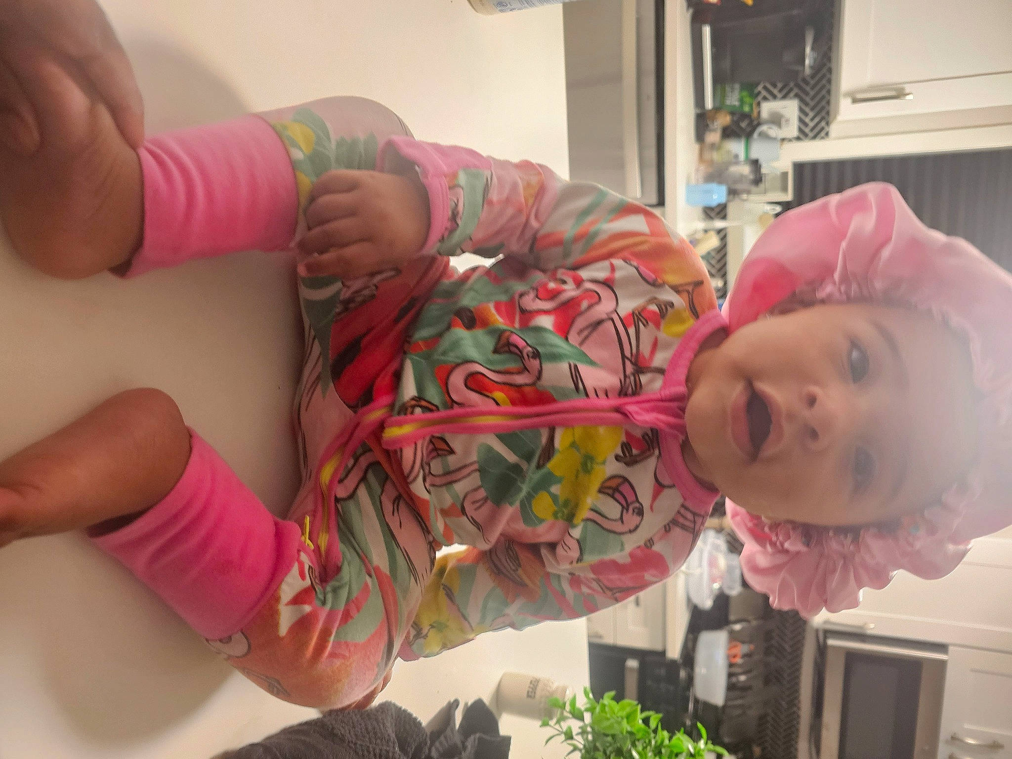 Yasmara joined the competition — help win amazing prizes! baby, baby_toddler_clothing, child, dress, fun, green, houseplant, joint, mouth, nose, organ, person, pink, plant, room, skin, smile, snapshot, textile, thumb