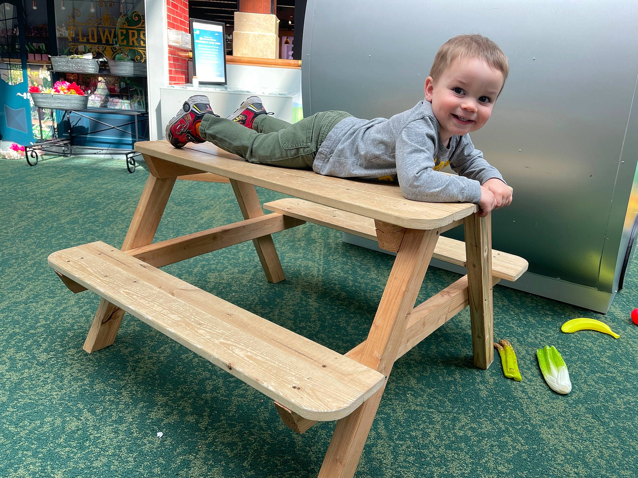 Lawson joined the competition — help win amazing prizes! baby, baby_products, baby_toddler_clothing, chair, child, comfort, flooring, folding_chair, fun, grass, hardwood, joy, leisure, outdoor_furniture, person, play, room, sitting, smile, table